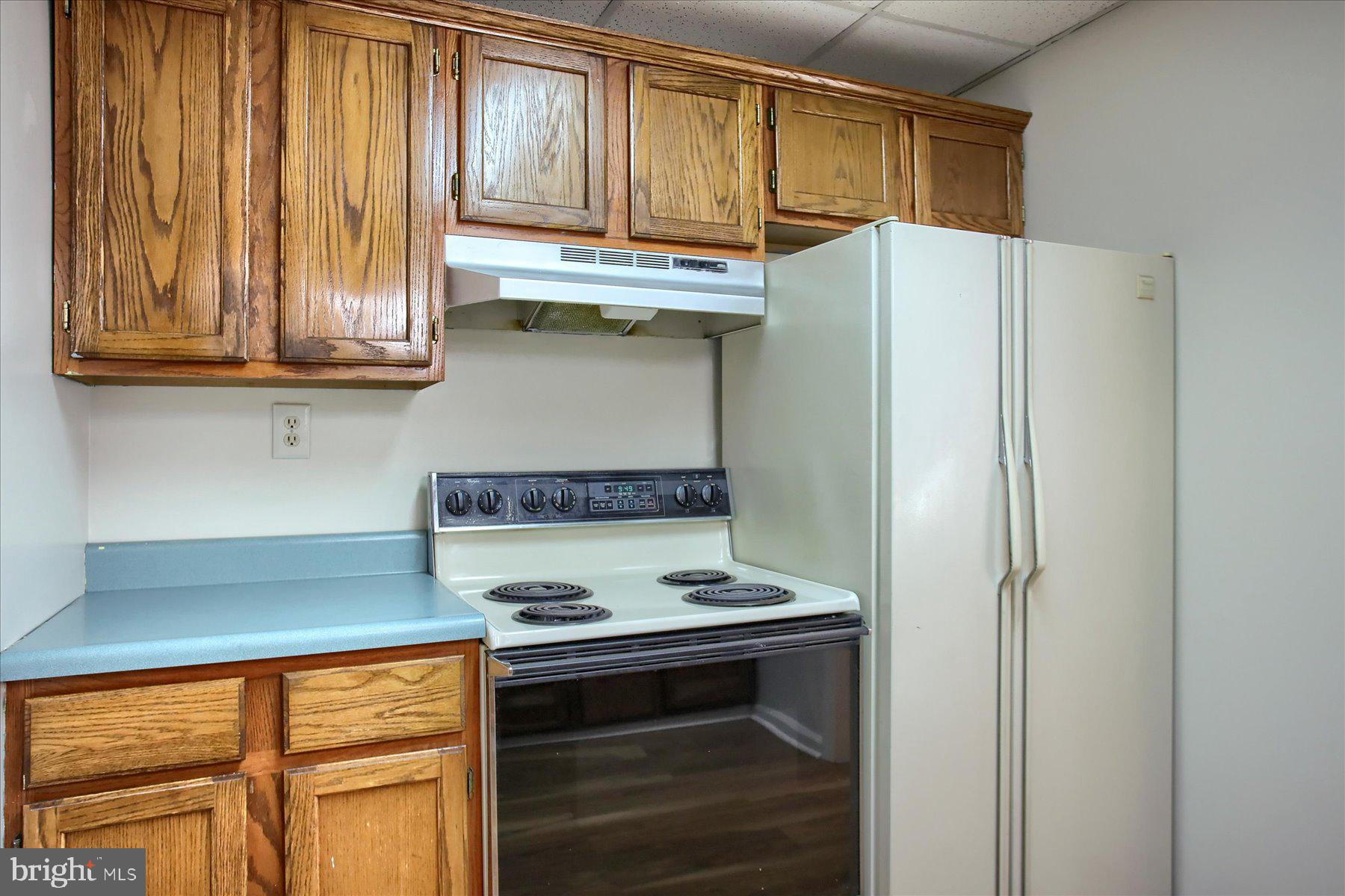 424 West Main Street Palmyra, PA 17078 - Photo 9 of 17 a kitchen with stainless steel appliances a refrigerator and a stove