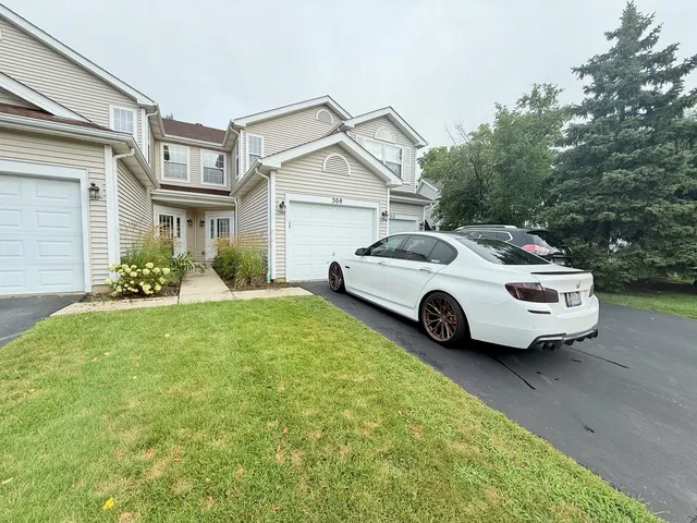 a car parked in front of a house