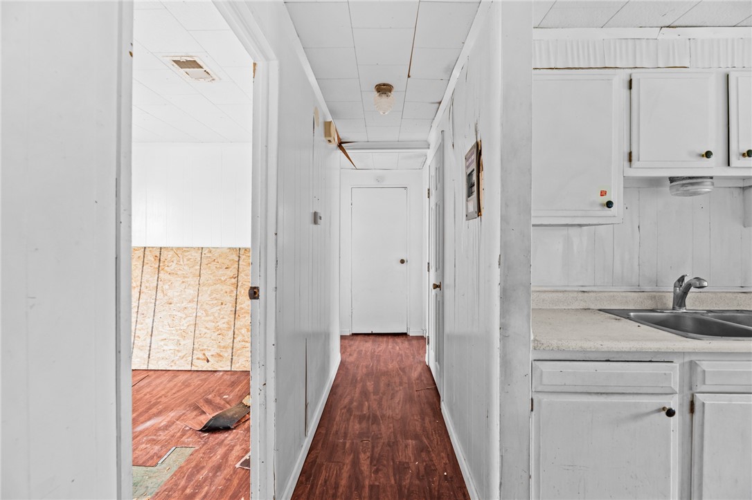 1011 Northcliff Drive Portland, TX 78374 - Photo 6 of 16 a en suite bathroom with a granite countertop sink and a mirror