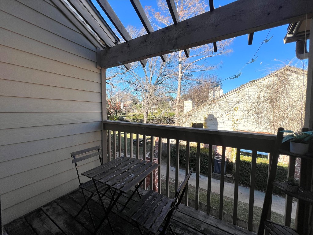 3801 Menchaca Road, Unit 50 Austin, TX 78704 - Photo 16 of 30 a view of a two chairs in the balcony