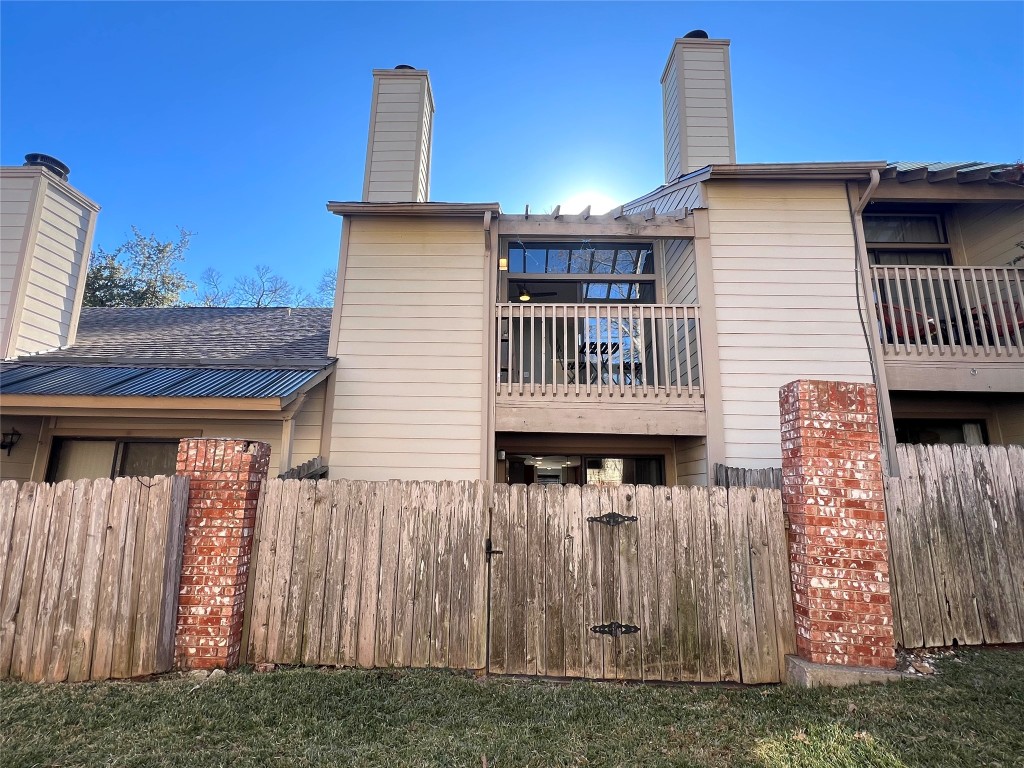 3801 Menchaca Road, Unit 50 Austin, TX 78704 - Photo 26 of 30 a view of a house with wooden fence