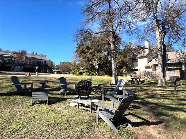 a building with trees in the background