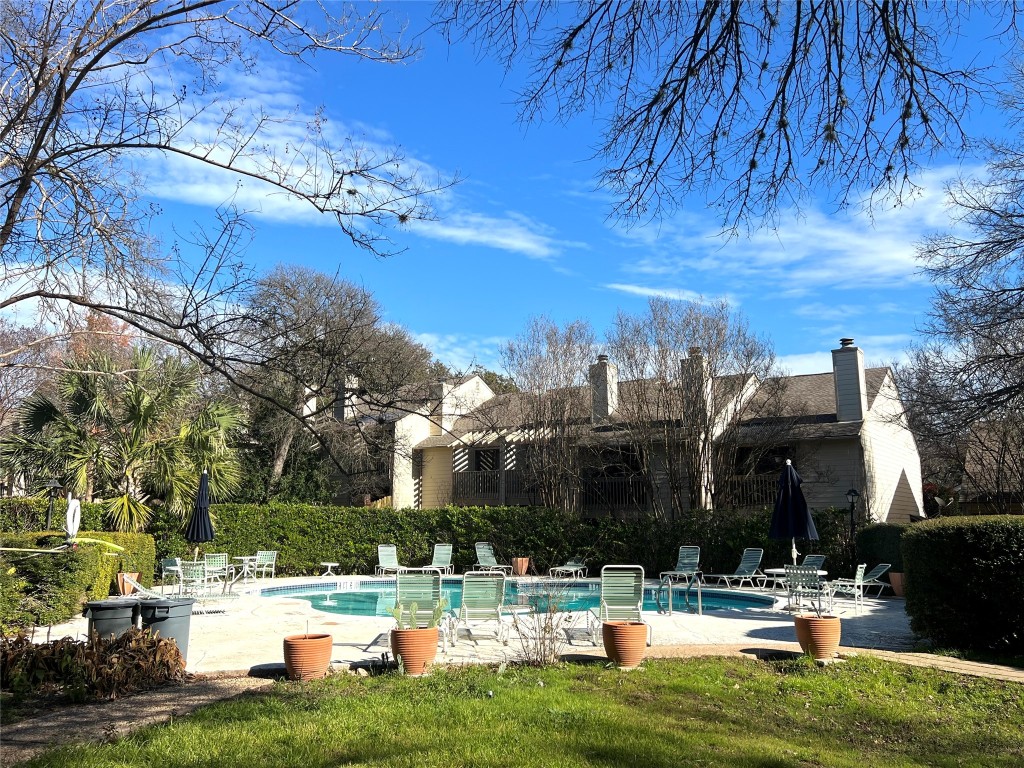 3801 Menchaca Road, Unit 50 Austin, TX 78704 - Photo 29 of 30 a view of a building with a swimming pool