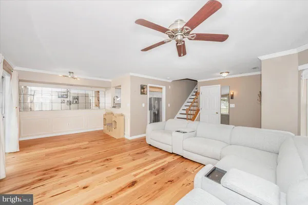 a large white bed in a white room
