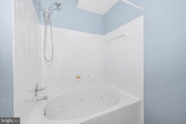 a bathroom with a bathtub