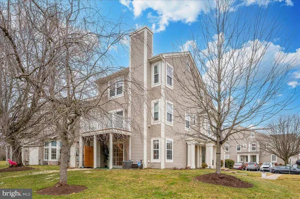 a view of a large building with a large trees