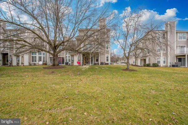 a large tree in front of building