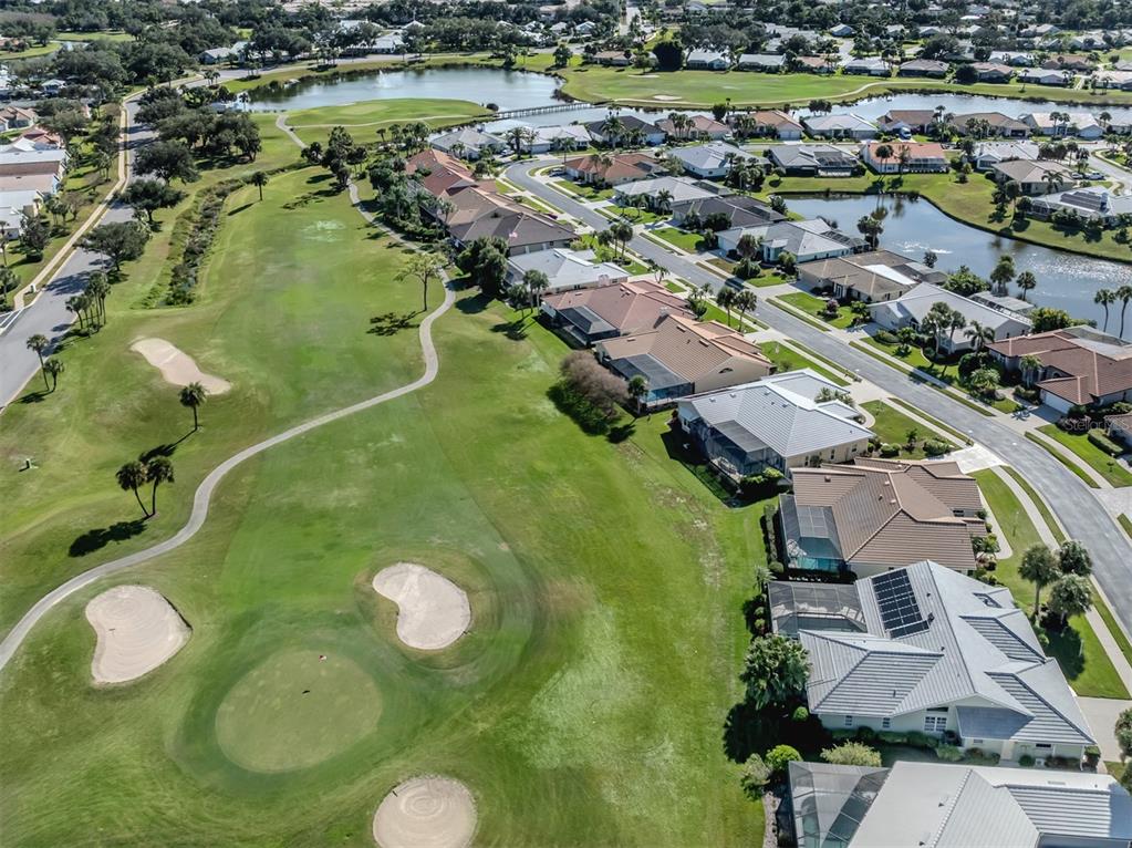 1684 Valley Drive Venice, FL 34292 - Photo 26 of 58 an aerial view of a residential houses with outdoor space