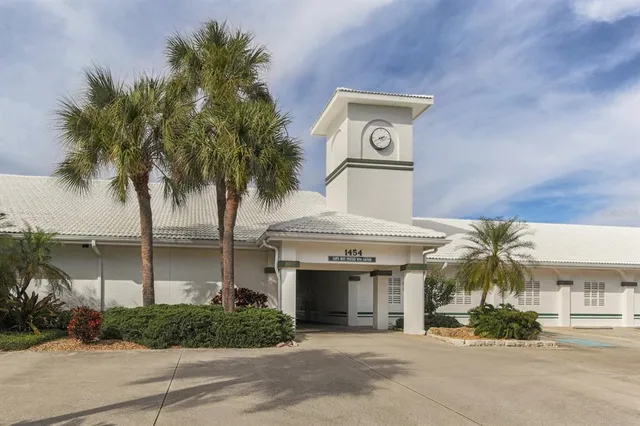 an aerial view of a house with a swimming pool