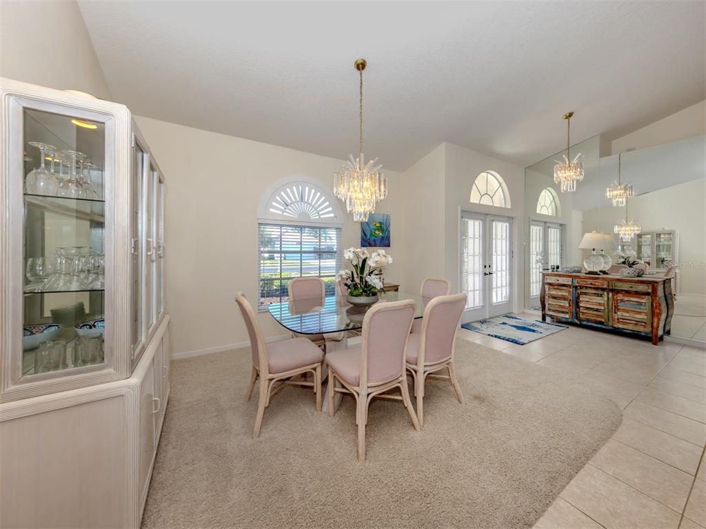 1684 Valley Drive Venice, FL 34292 - Photo 10 of 58 a view of a dining room with furniture window and outside view