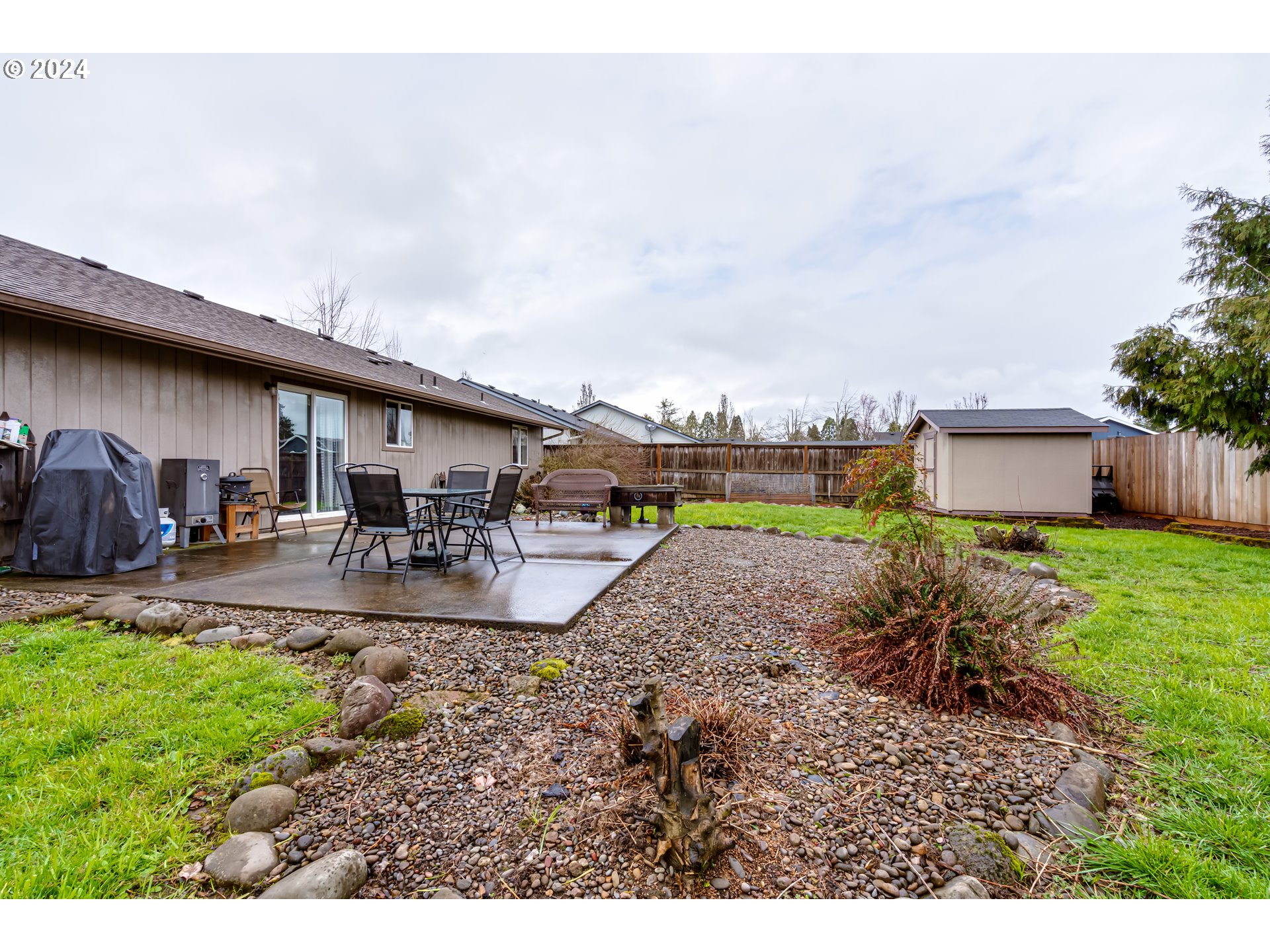 895 Aldridge Place Springfield, OR 97478 - Photo 3 of 19 a view of a swimming pool with a patio and a yard