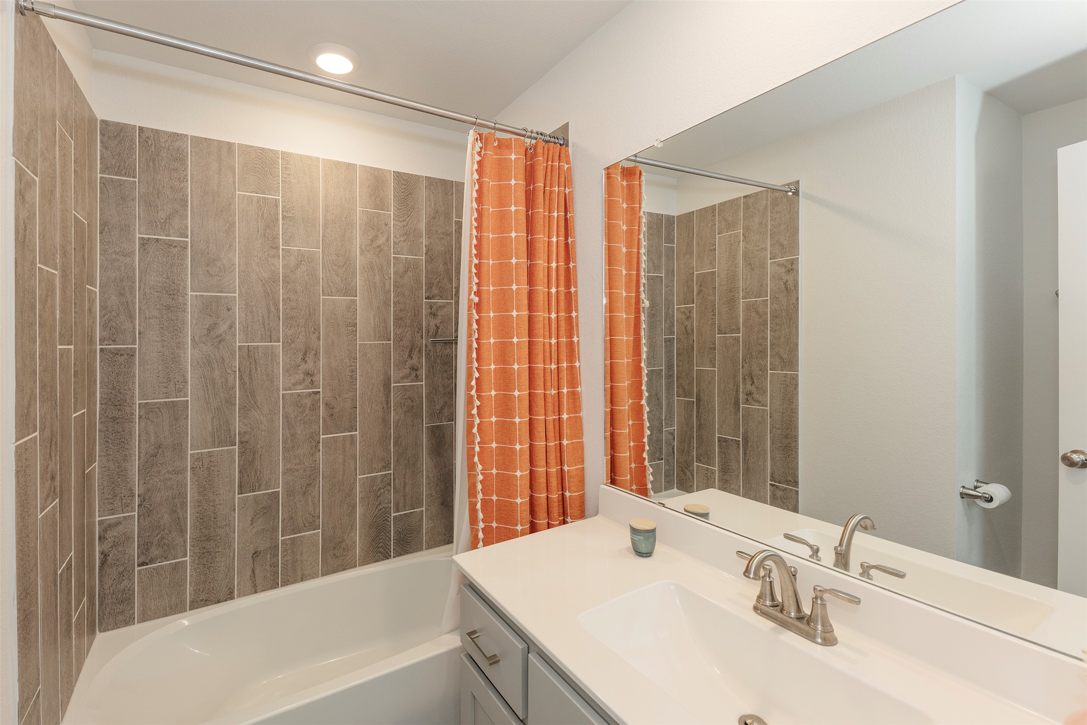 236 Garner Drive Kyle, TX 78640 - Photo 26 of 37 Bathroom featuring shower / tub combo and vanity