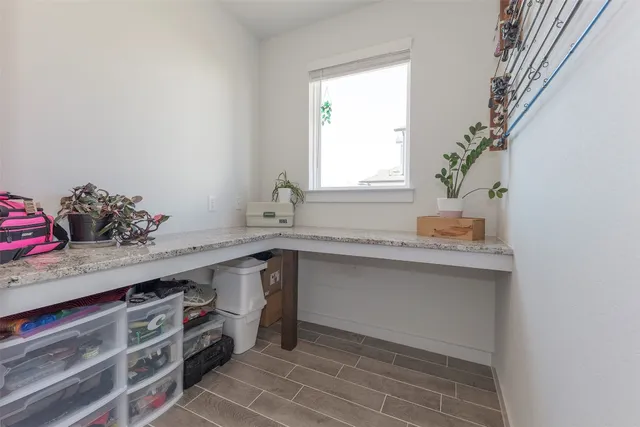 a kitchen with stainless steel appliances a sink and cabinets