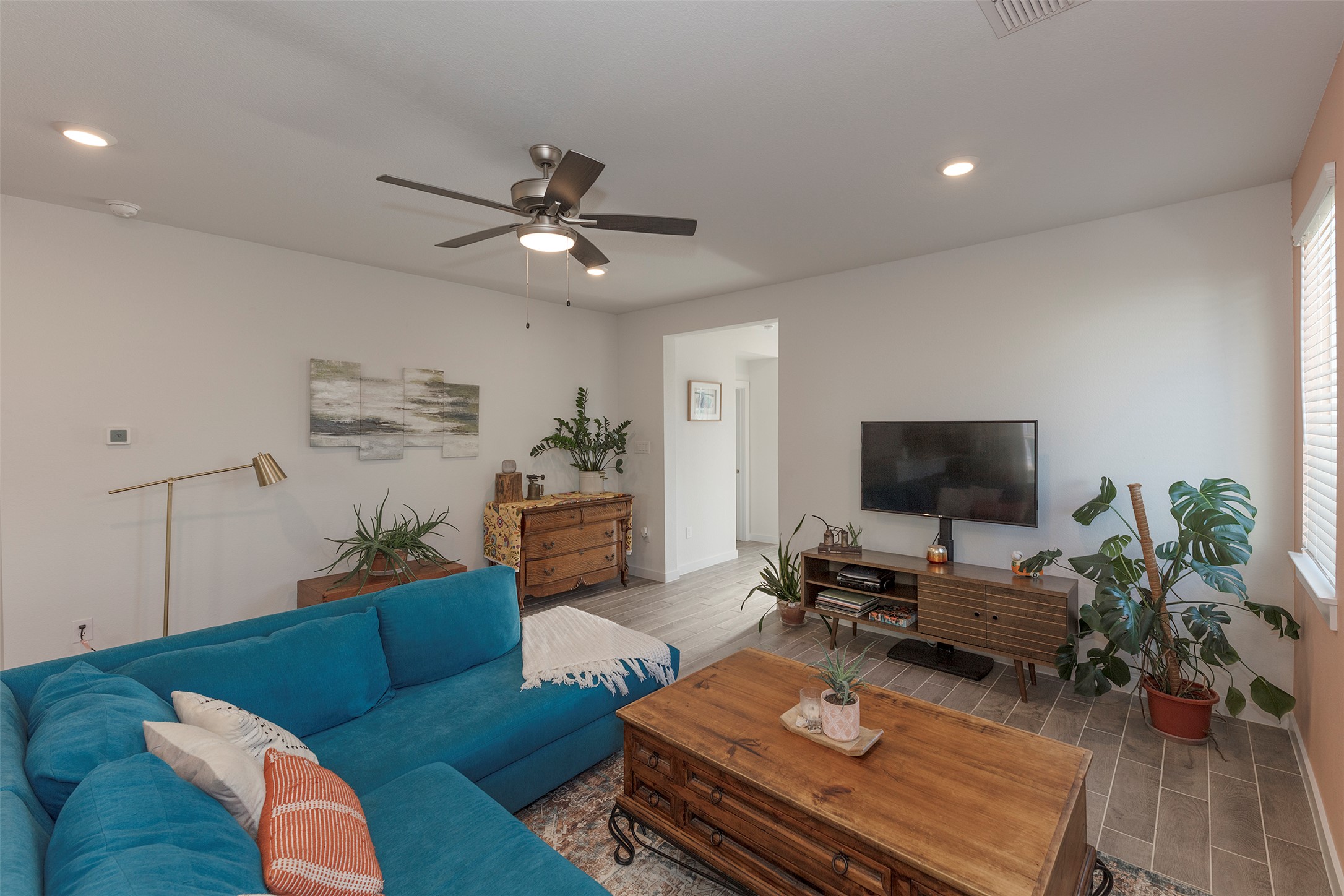 236 Garner Drive Kyle, TX 78640 - Photo 8 of 37 Living room with wood finish floors, recessed lighting, and ceiling fan