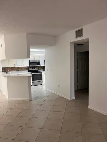 $1,850 | 3021 Alcazar Place, Unit 203, Palm Beach Gardens, FL 33410