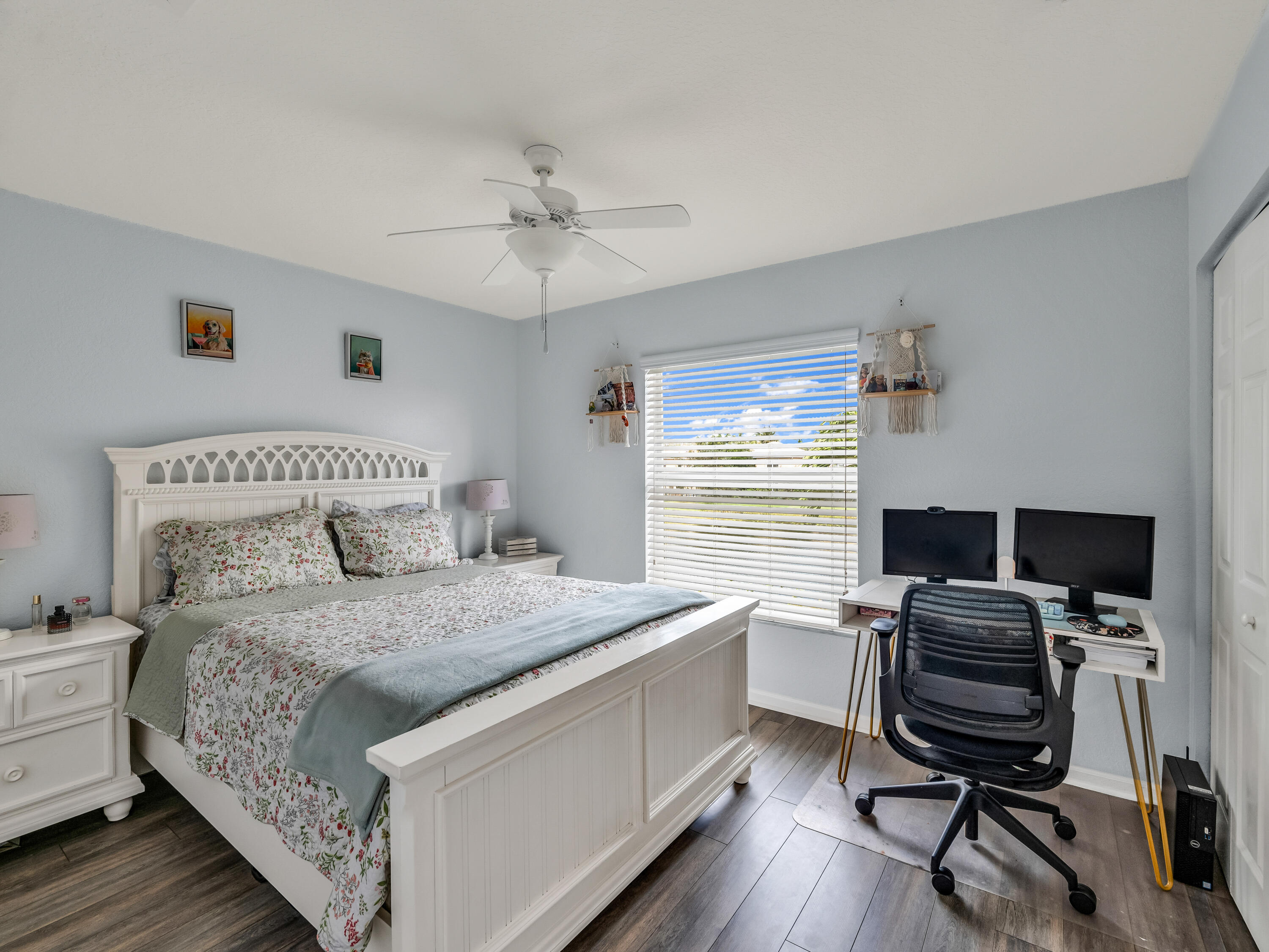 7951 Red Mahogany Road Boynton Beach, FL 33437 - Photo 23 of 33 a bedroom with a bed and a desk
