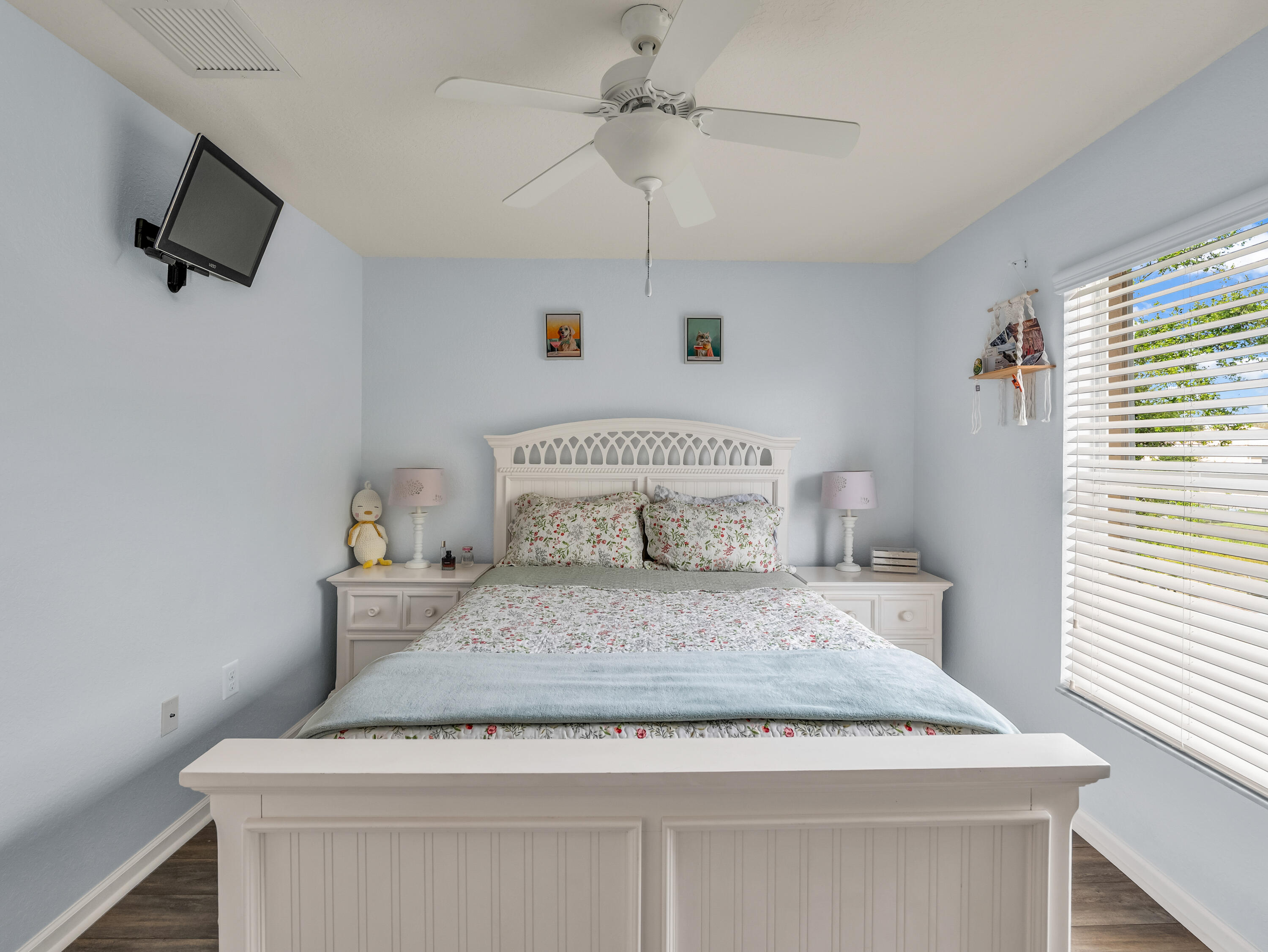 7951 Red Mahogany Road Boynton Beach, FL 33437 - Photo 25 of 33 a bedroom with a bed and a window