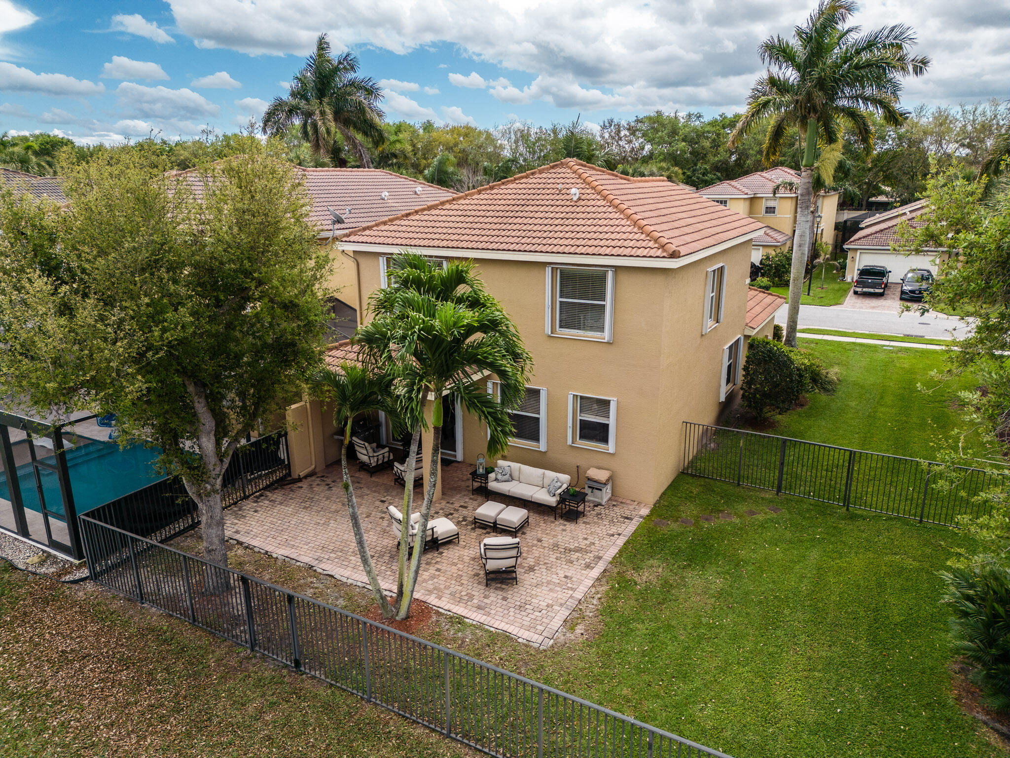 7951 Red Mahogany Road Boynton Beach, FL 33437 - Photo 30 of 33 a aerial view of a house with garden