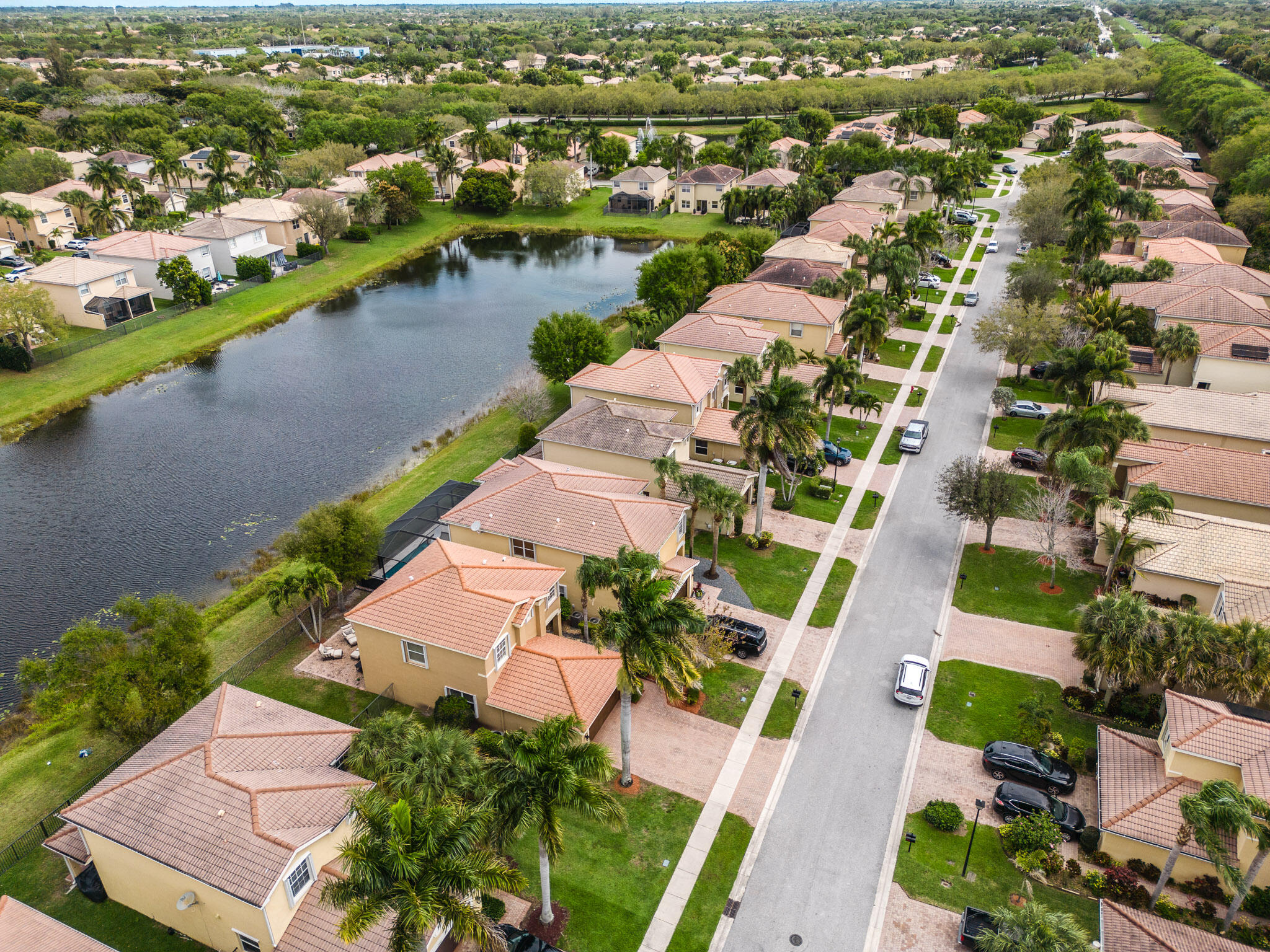 7951 Red Mahogany Road Boynton Beach, FL 33437 - Photo 31 of 33 an aerial view of residential houses with outdoor space