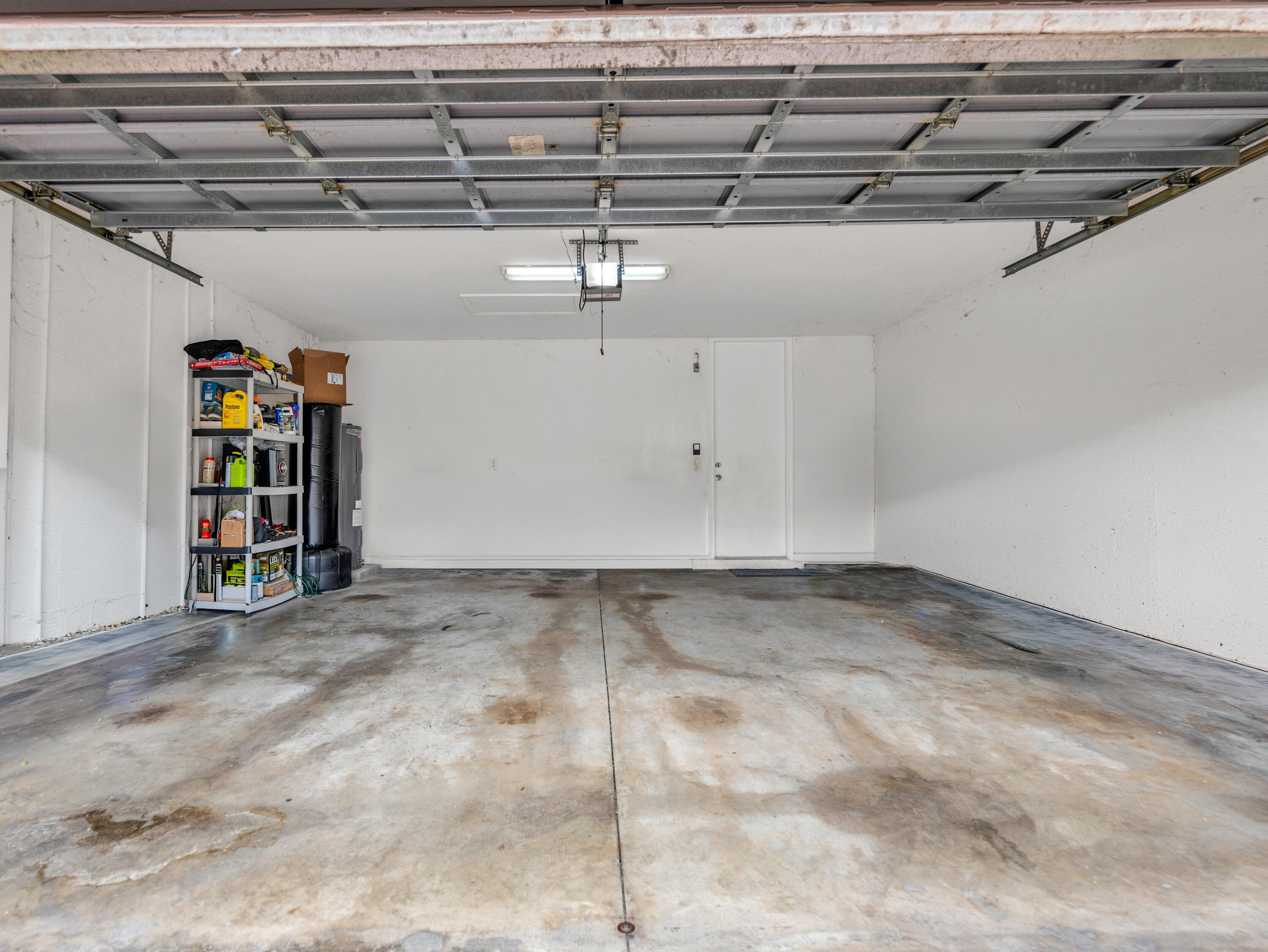 7951 Red Mahogany Road Boynton Beach, FL 33437 - Photo 5 of 33 a view of storage and utility room