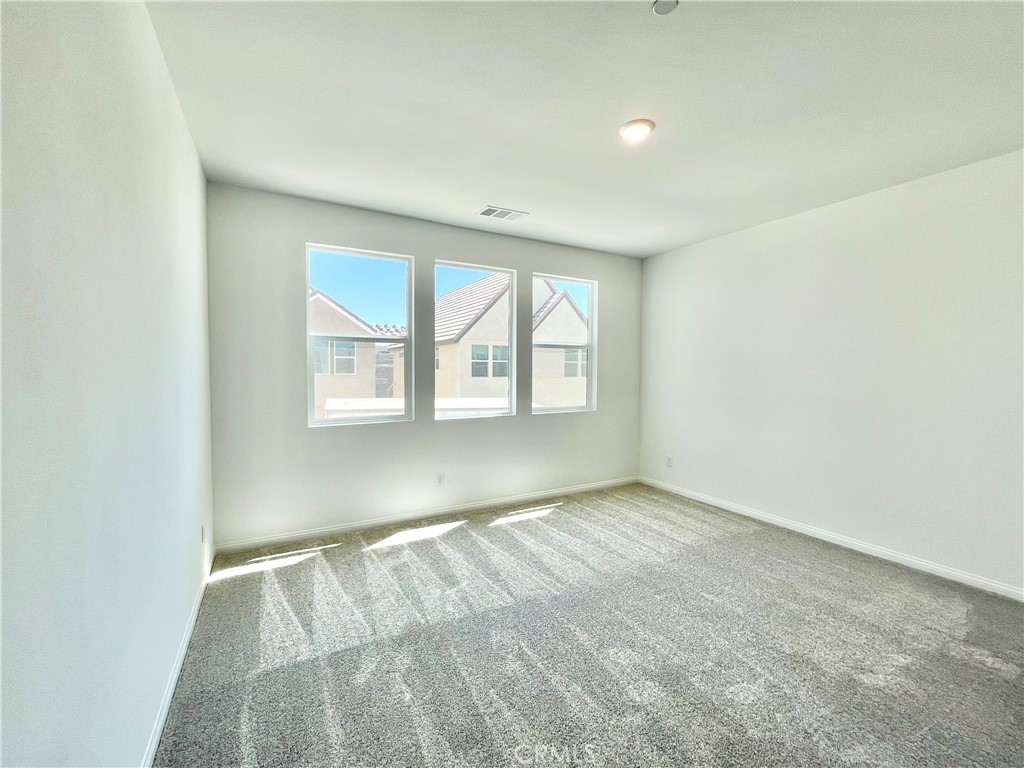 27391 Powder Ridge Court Valencia, CA 91381 - Photo 16 of 22 an empty room with windows