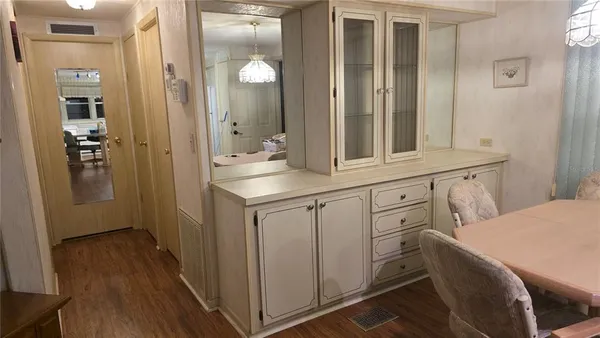 a bathroom with a sink and mirror