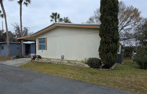 a house with trees in front of it