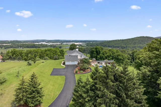 a view of a city with mountains in the background