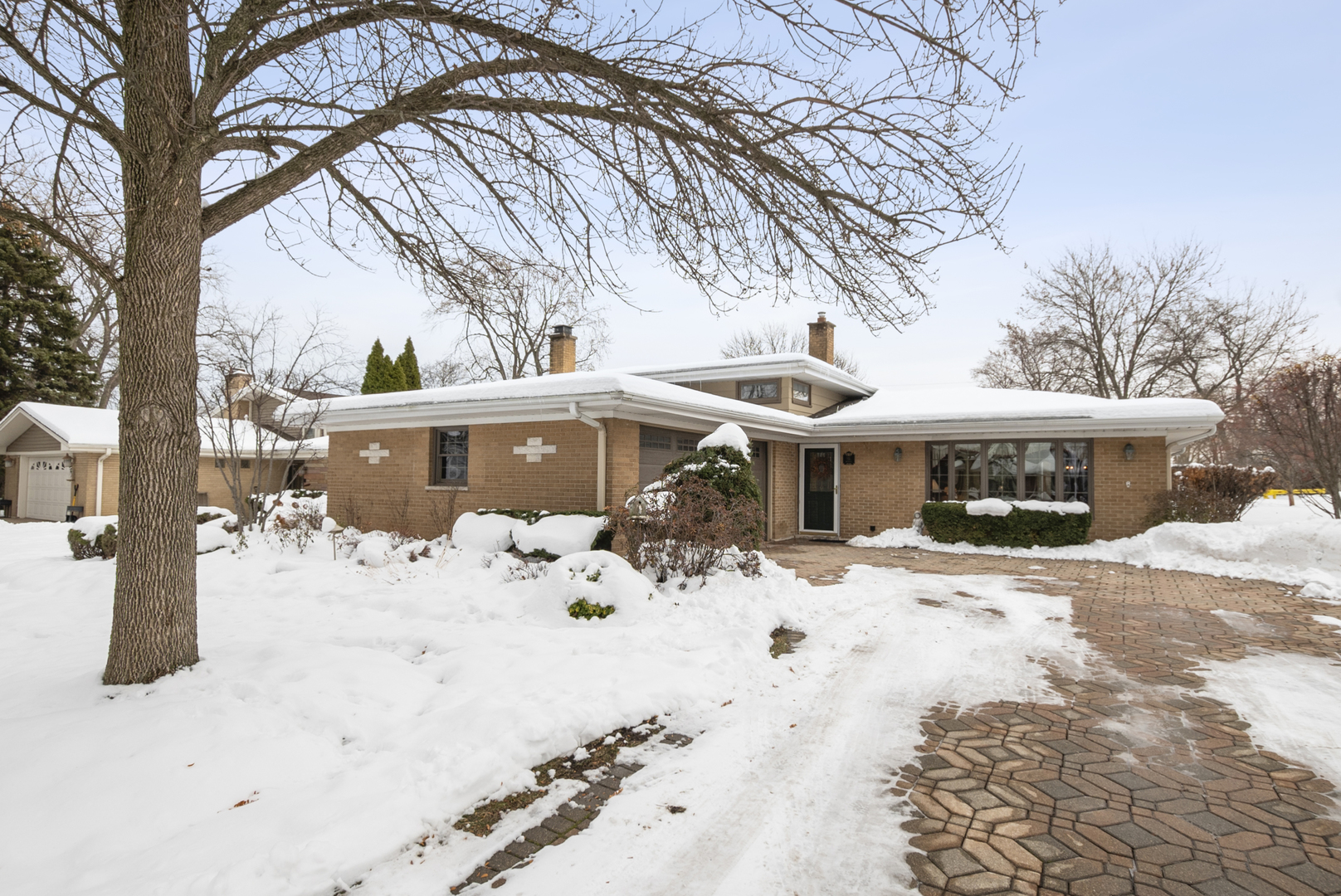 a view of a house with snow on the floor