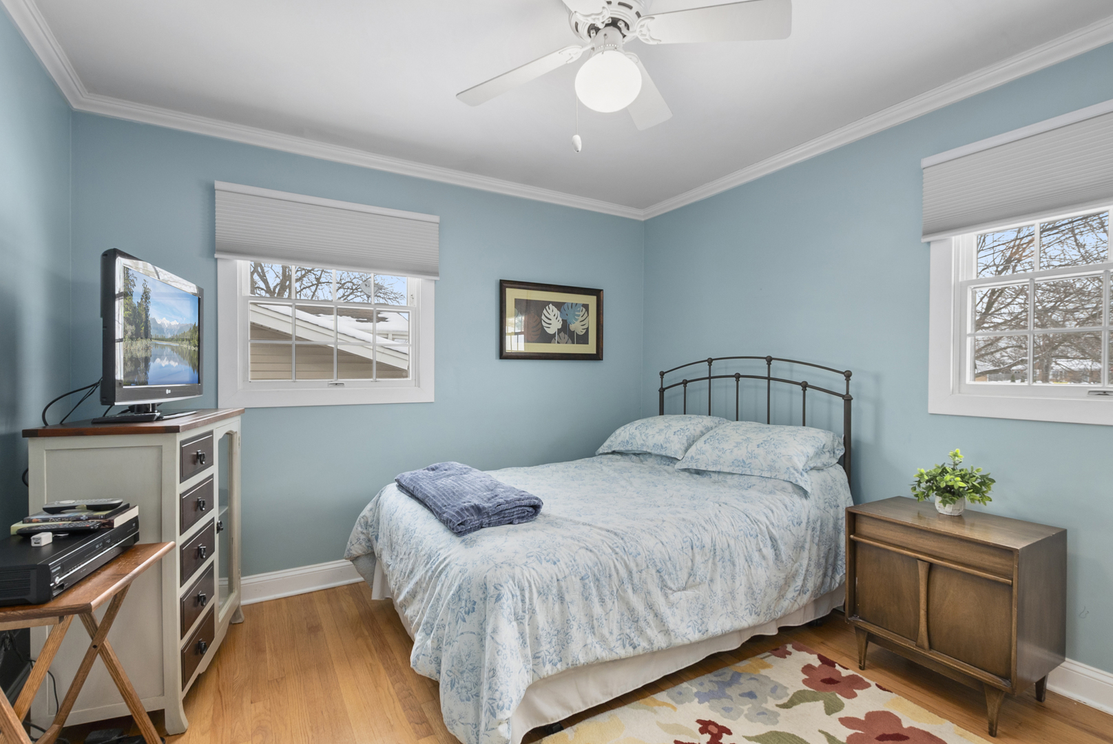 9 Merry Court Countryside, IL 60525 - Photo 11 of 19 a bedroom with a bed and a flat screen tv