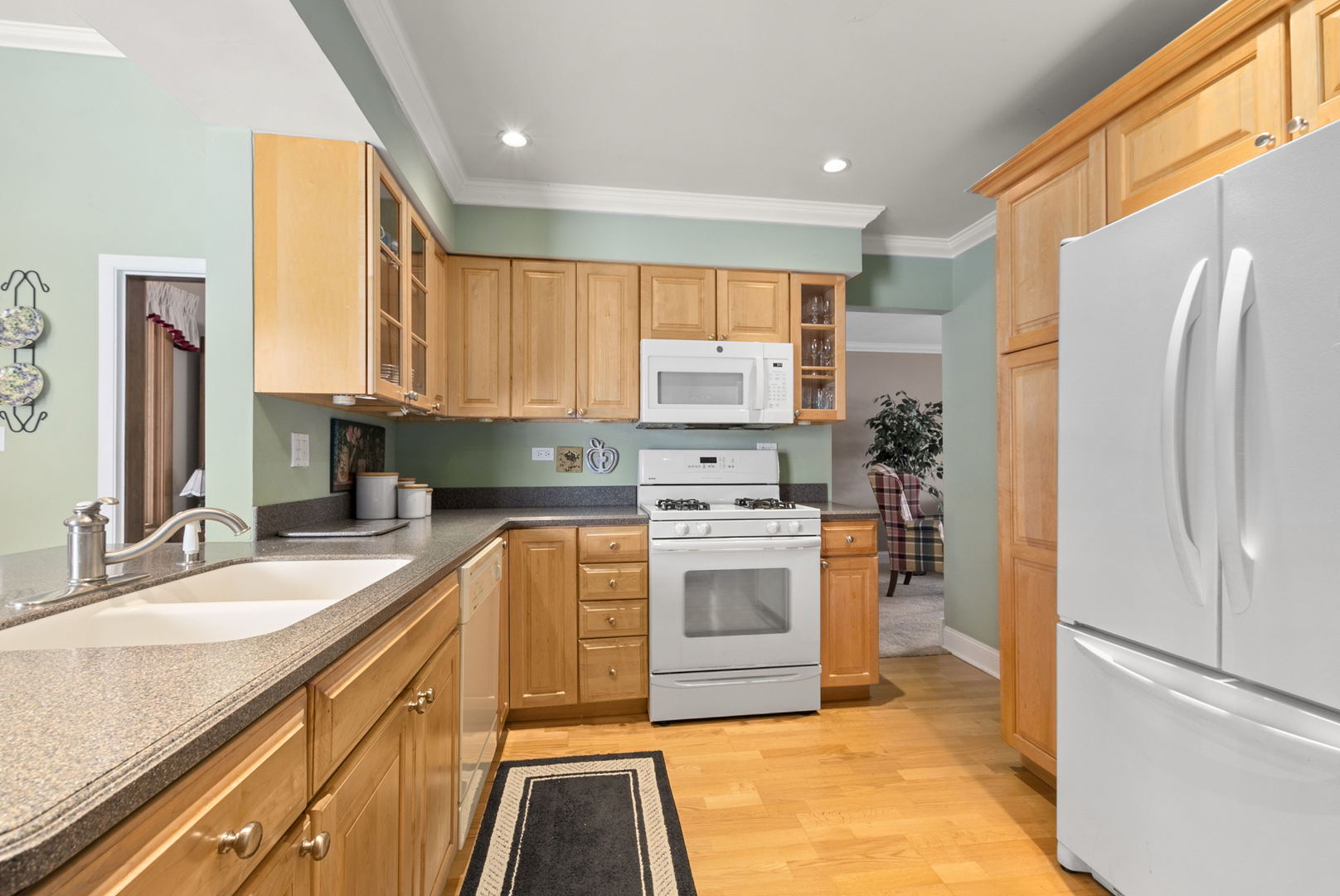 9 Merry Court Countryside, IL 60525 - Photo 5 of 19 a kitchen with stainless steel appliances granite countertop a refrigerator sink and stove