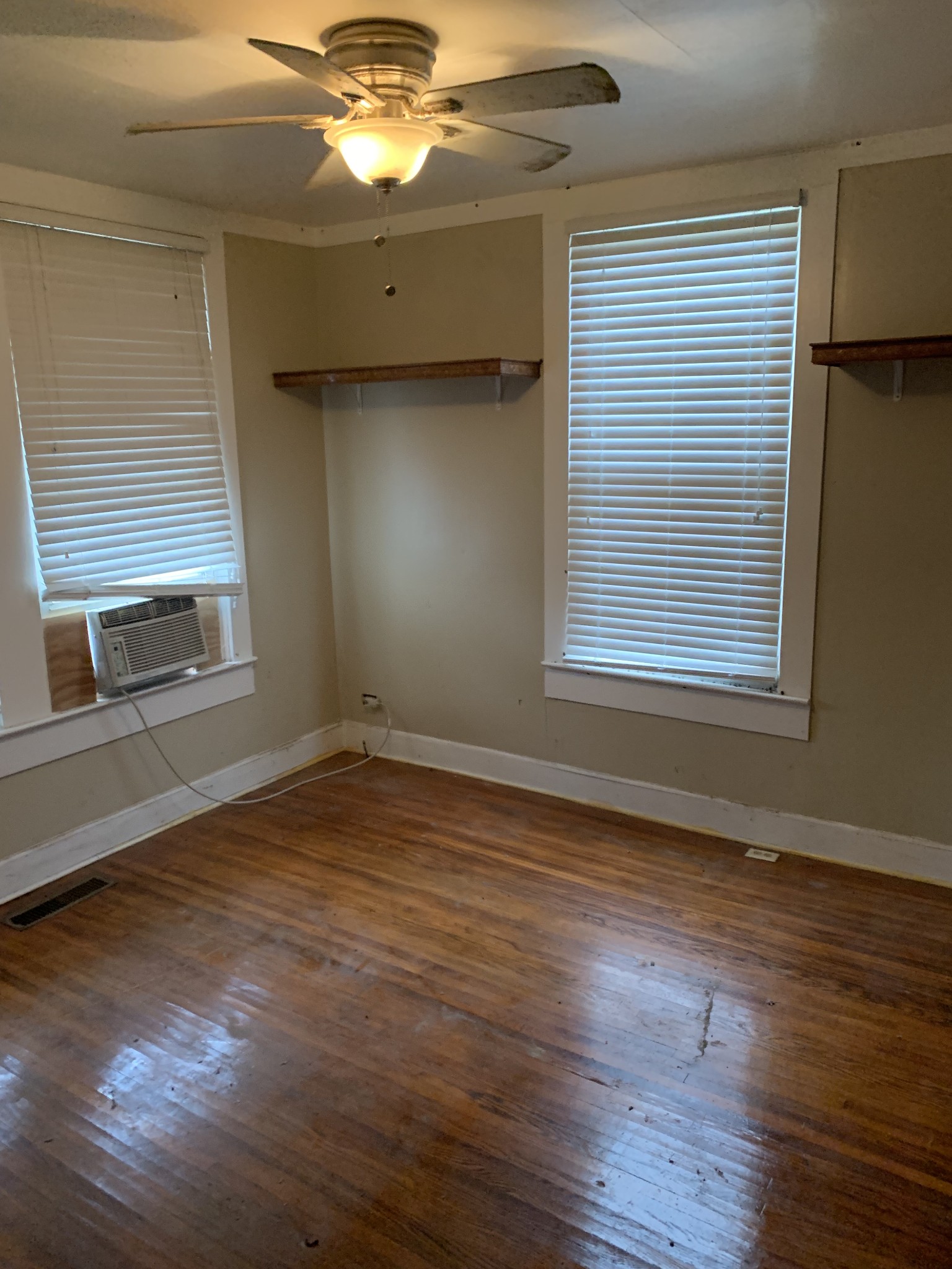 14161 Buffalo Valley Road Silver Point, TN 38582 - Photo 19 of 24 an empty room with wooden floor and windows