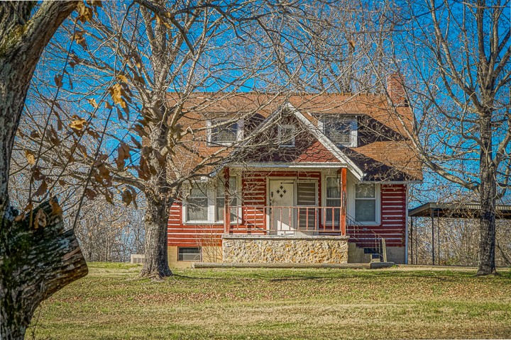 14161 Buffalo Valley Road Silver Point, TN 38582 - Photo 2 of 24 a house with swimming pool in front of it
