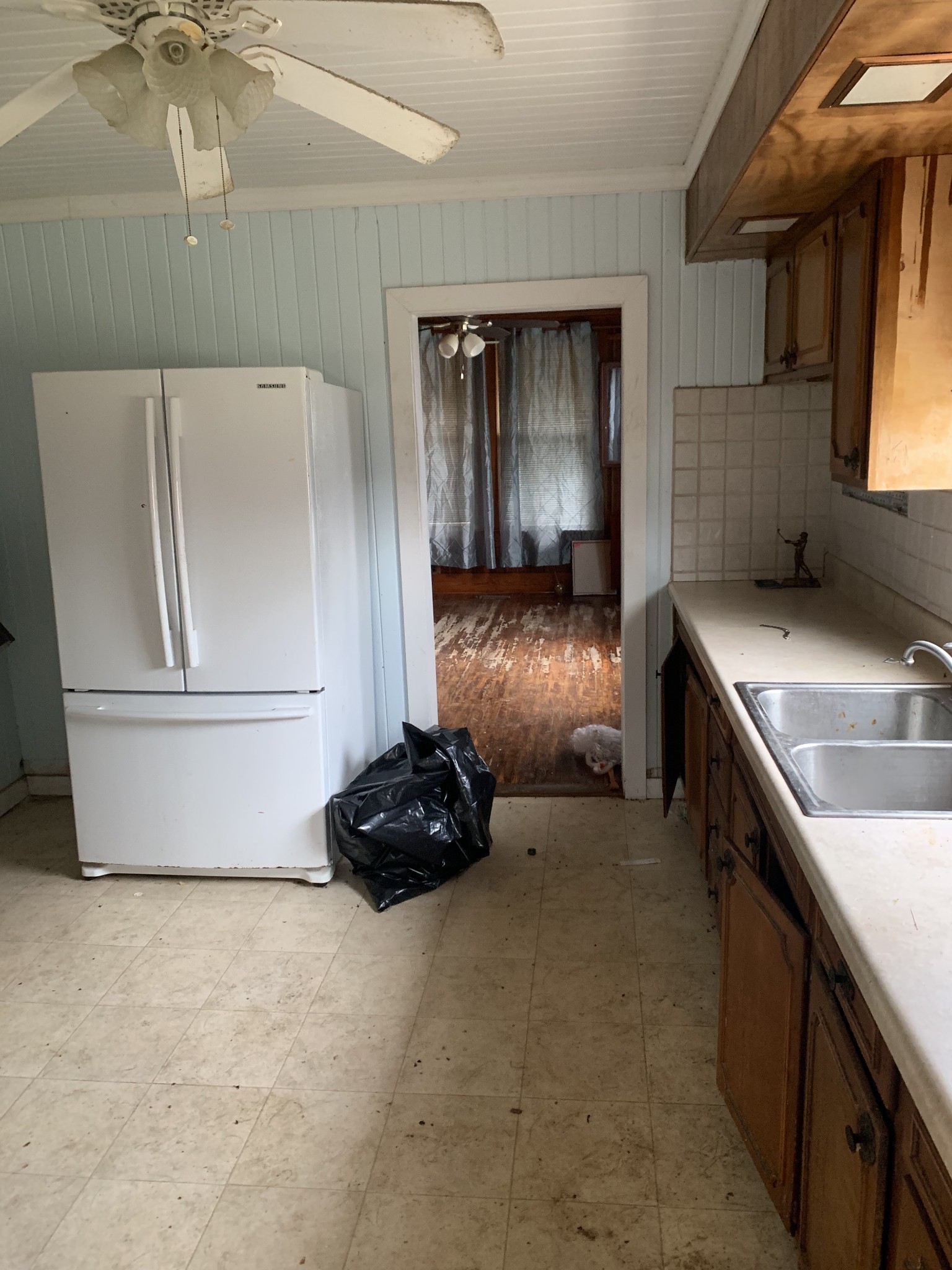 14161 Buffalo Valley Road Silver Point, TN 38582 - Photo 21 of 24 a kitchen with a refrigerator and a sink