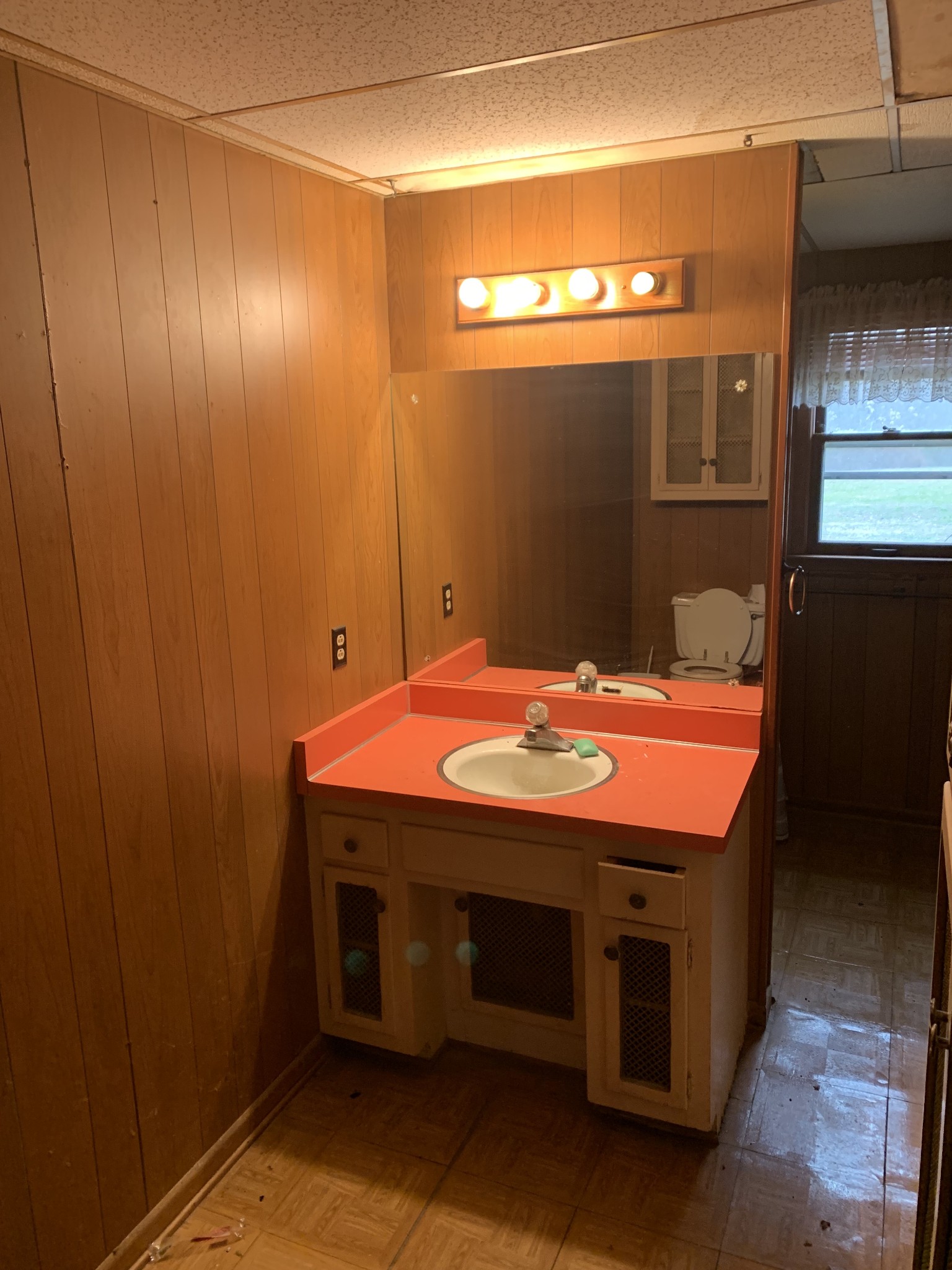 14161 Buffalo Valley Road Silver Point, TN 38582 - Photo 24 of 24 a bathroom with a sink and mirror