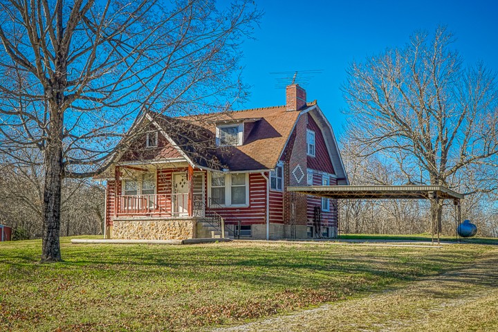 14161 Buffalo Valley Road Silver Point, TN 38582 - Photo 3 of 24 a front view of a house with a garden