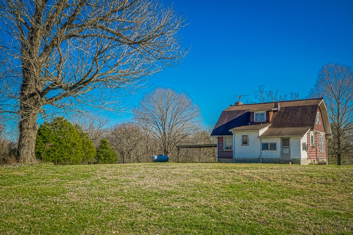 14161 Buffalo Valley Road Silver Point, TN 38582 - Photo 6 of 24 a house view with a garden space