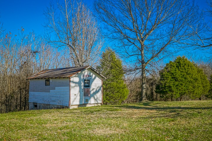 14161 Buffalo Valley Road Silver Point, TN 38582 - Photo 9 of 24 a view of a house with a yard