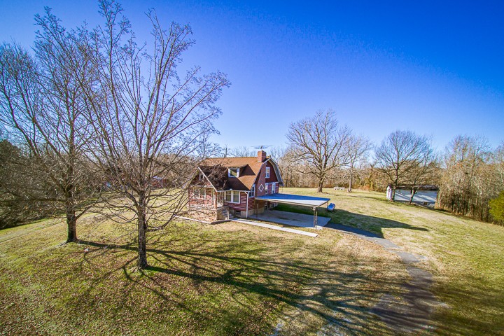 14161 Buffalo Valley Road Silver Point, TN 38582 - Photo 10 of 24 a view of a lake with a yard