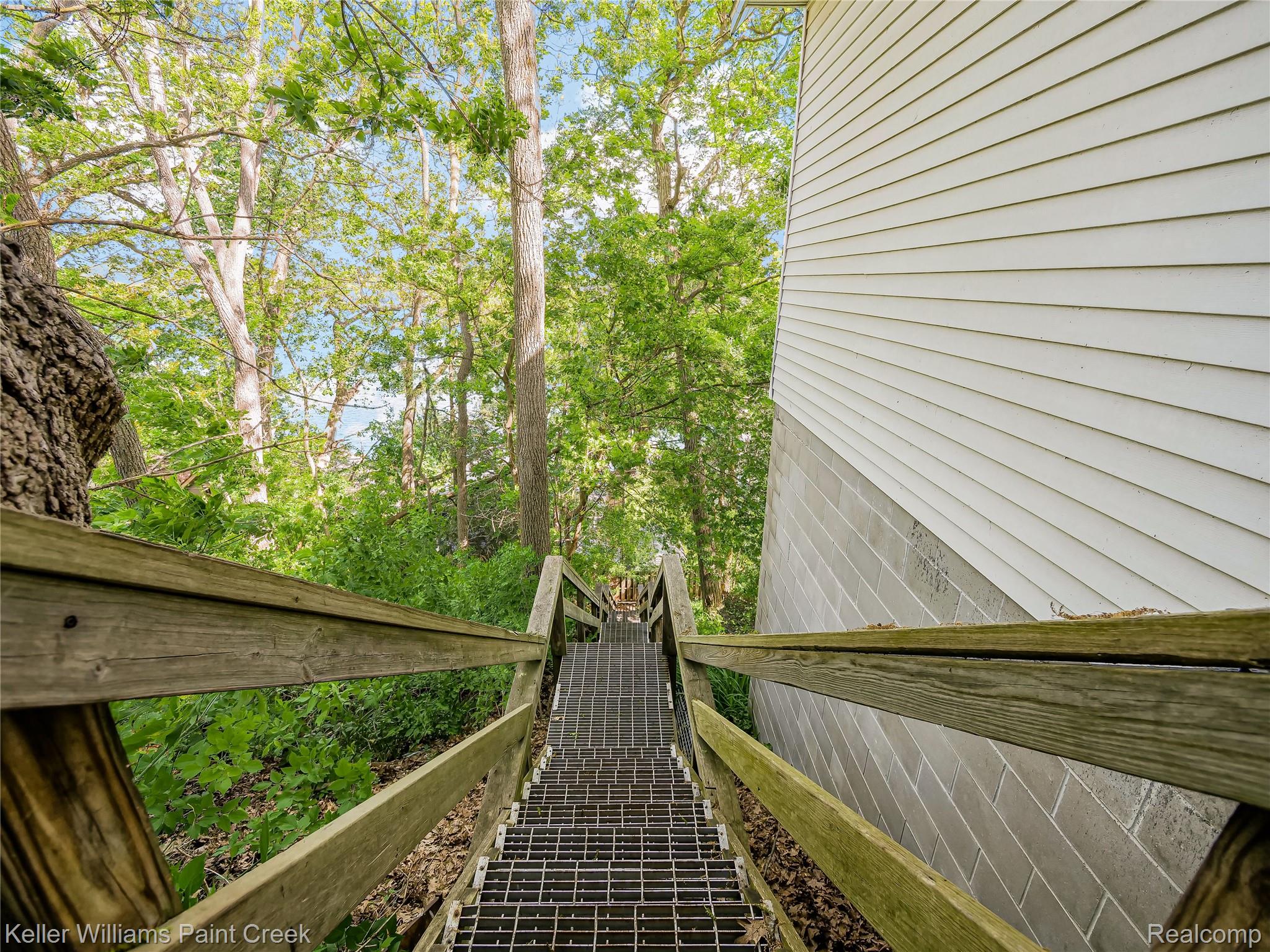 227 Ora Road Oxford, MI 48371 - Photo 9 of 60 Private Stairs Down to House (70 stairs)