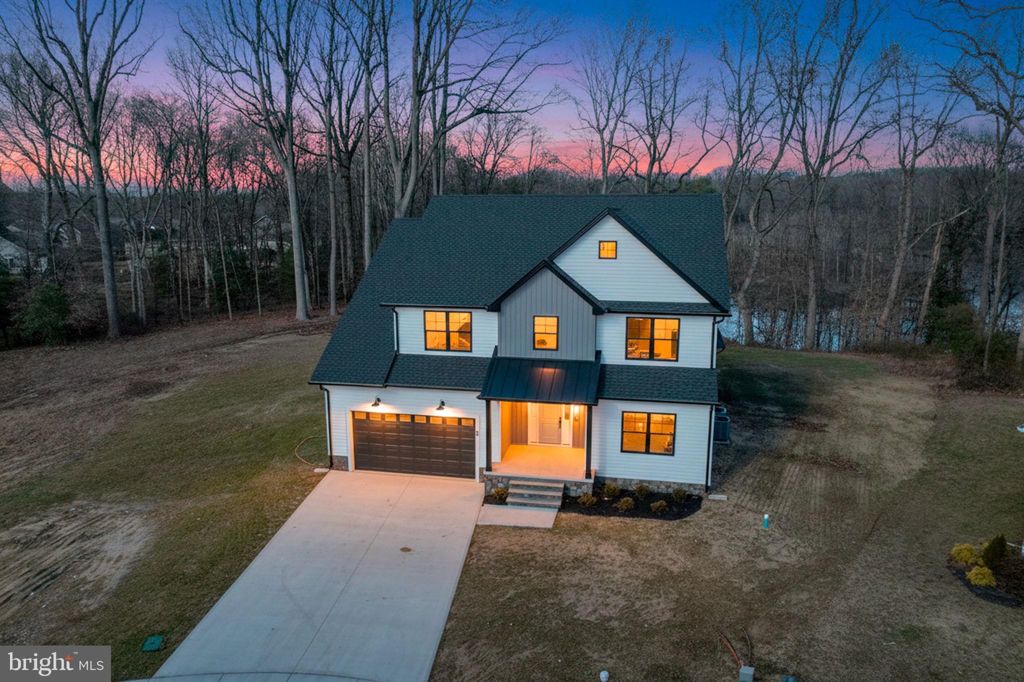 a front view of a house with street