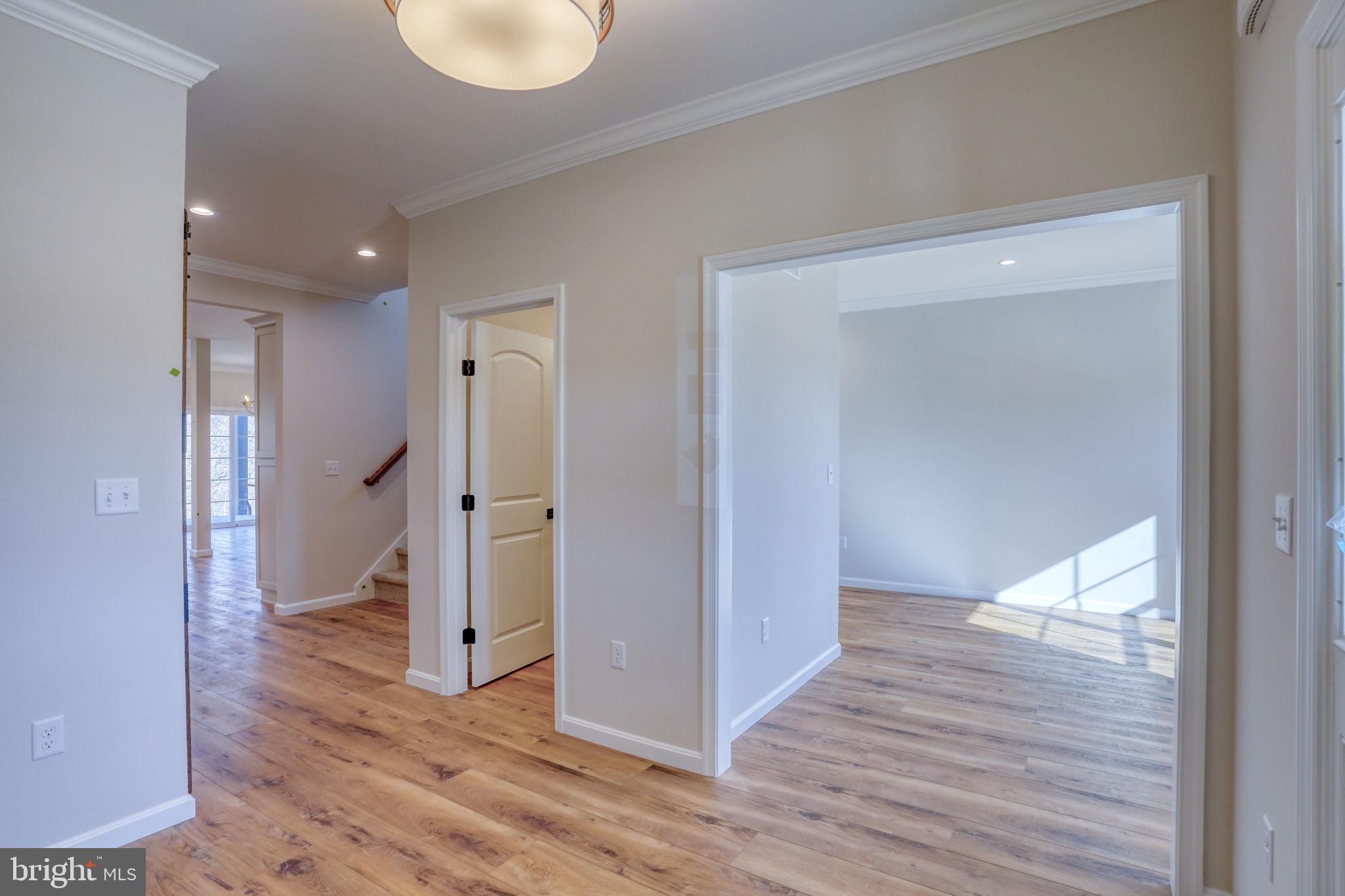 39 Doc Court Felton, DE 19943 - Photo 15 of 70 Foyer looking into flex space and powder room
