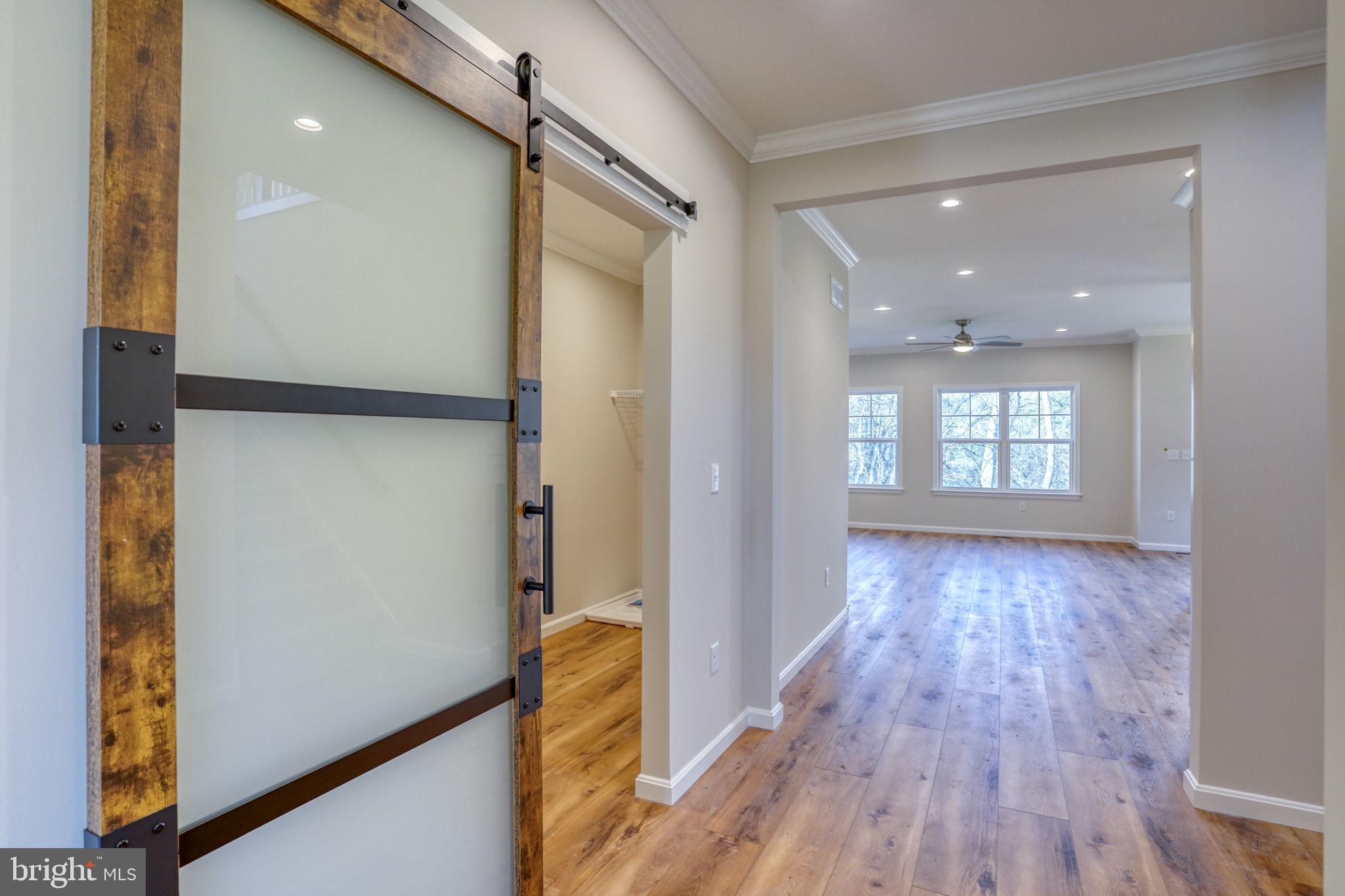 39 Doc Court Felton, DE 19943 - Photo 21 of 70 a view of hallway with wooden floor