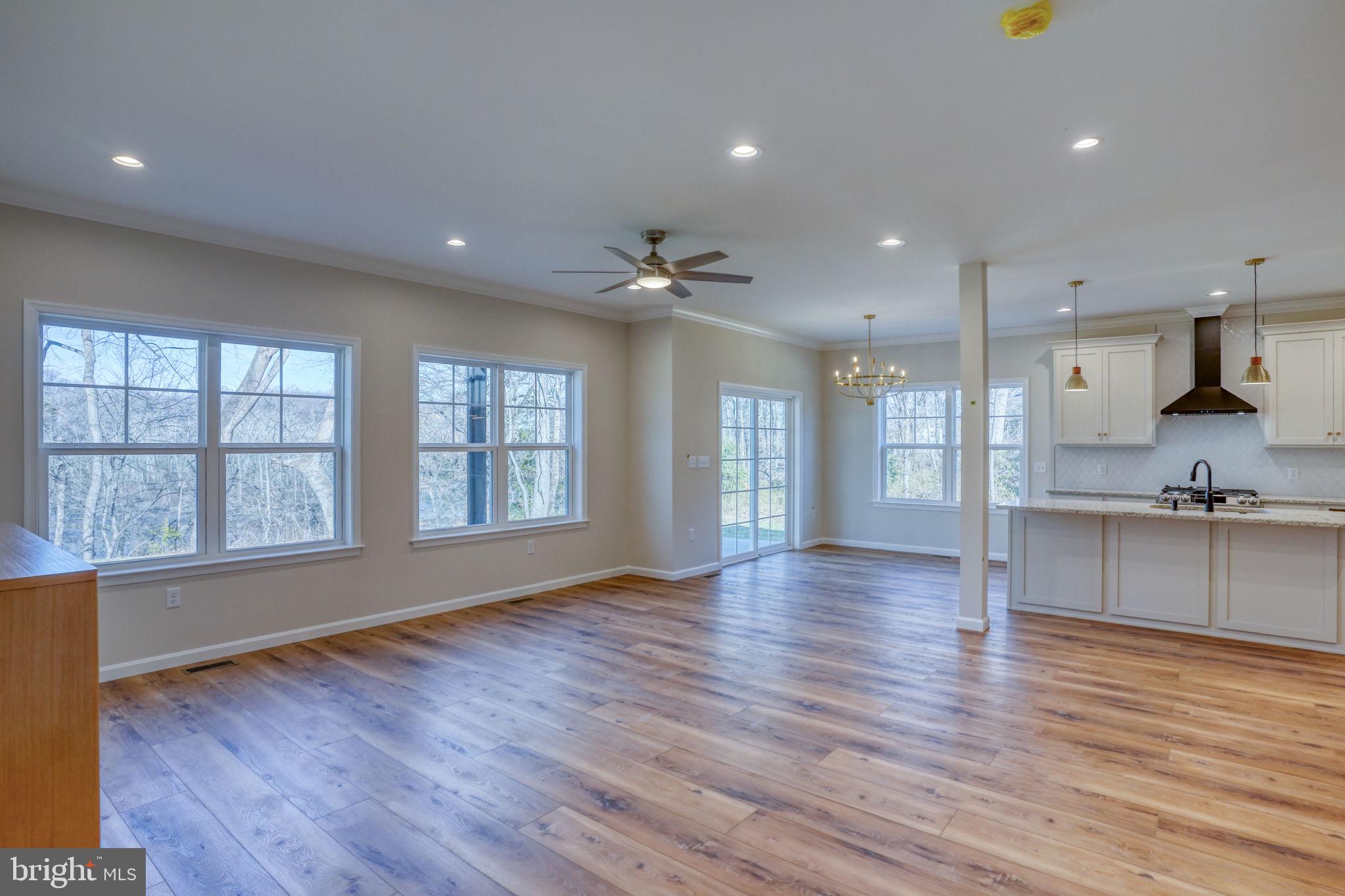 39 Doc Court Felton, DE 19943 - Photo 33 of 70 a view of an empty room with a window and wooden floor