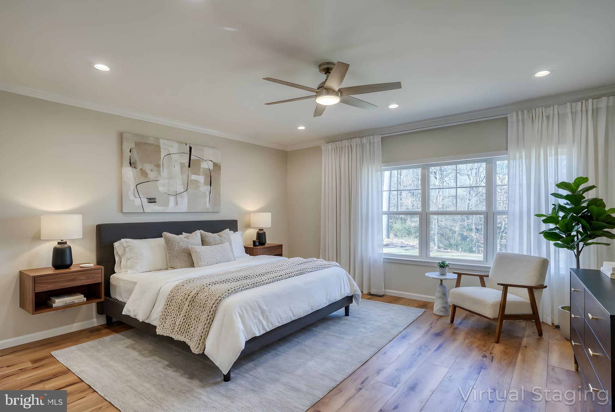 39 Doc Court Felton, DE 19943 - Photo 36 of 70 a bedroom with a large bed and a potted plant