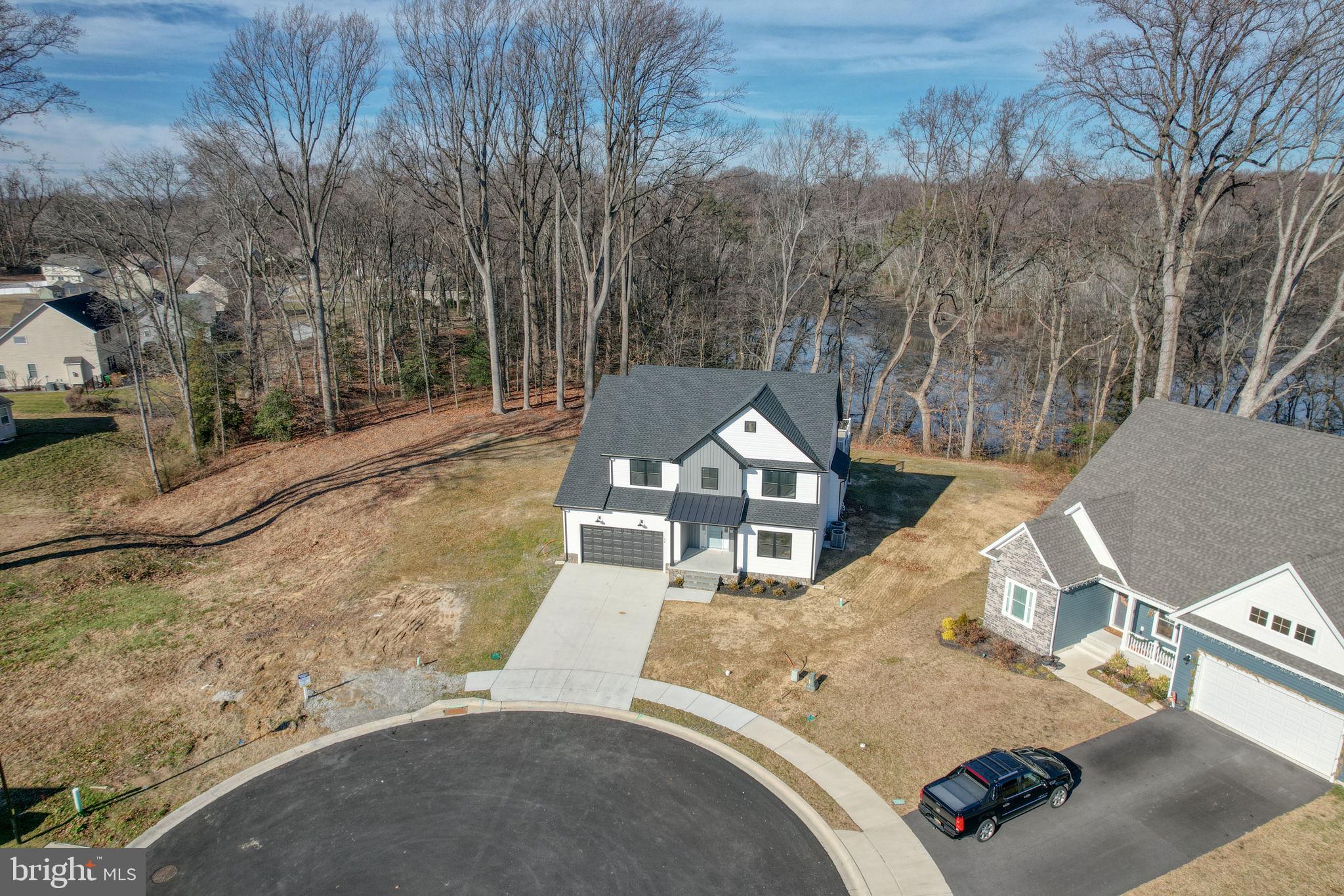 39 Doc Court Felton, DE 19943 - Photo 4 of 70 a view of a house with a yard