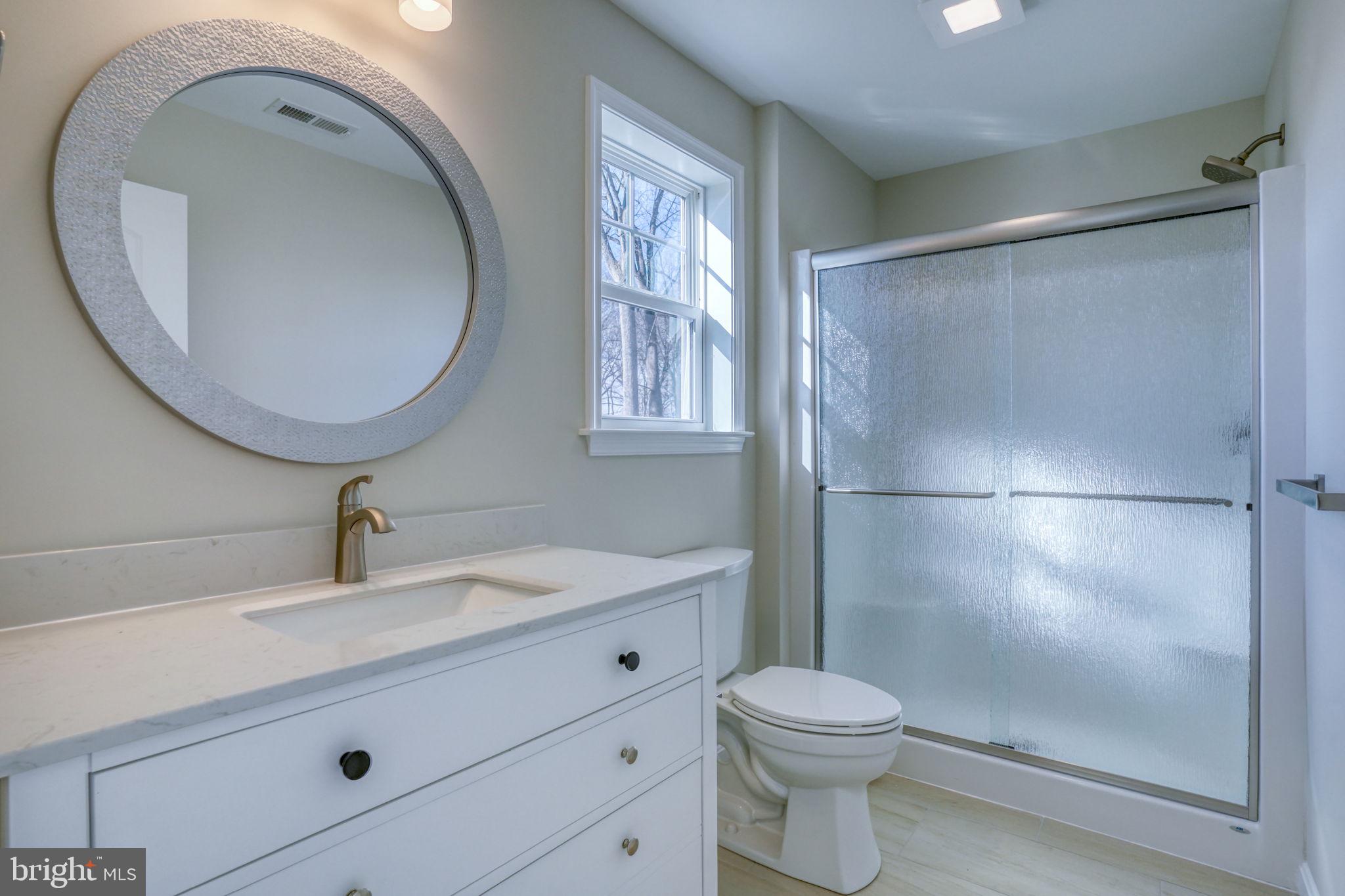 39 Doc Court Felton, DE 19943 - Photo 50 of 70 Ensuite bathroom featuring a white quartz vanity