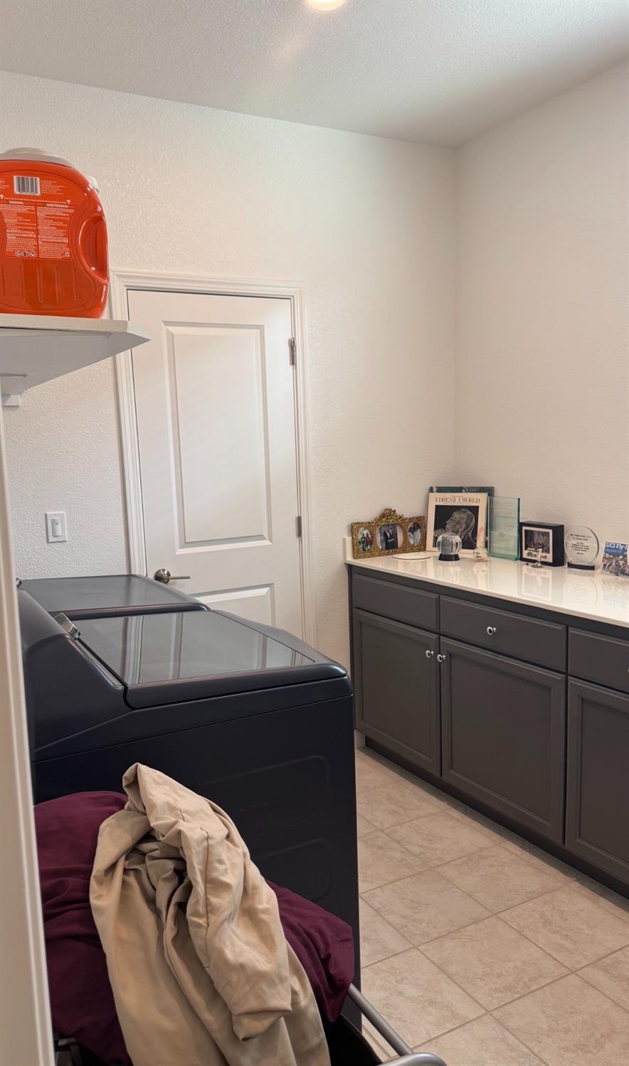 461 Walcott Street Manteca, CA 95336 - Photo 11 of 18 a kitchen with a sink and cabinets