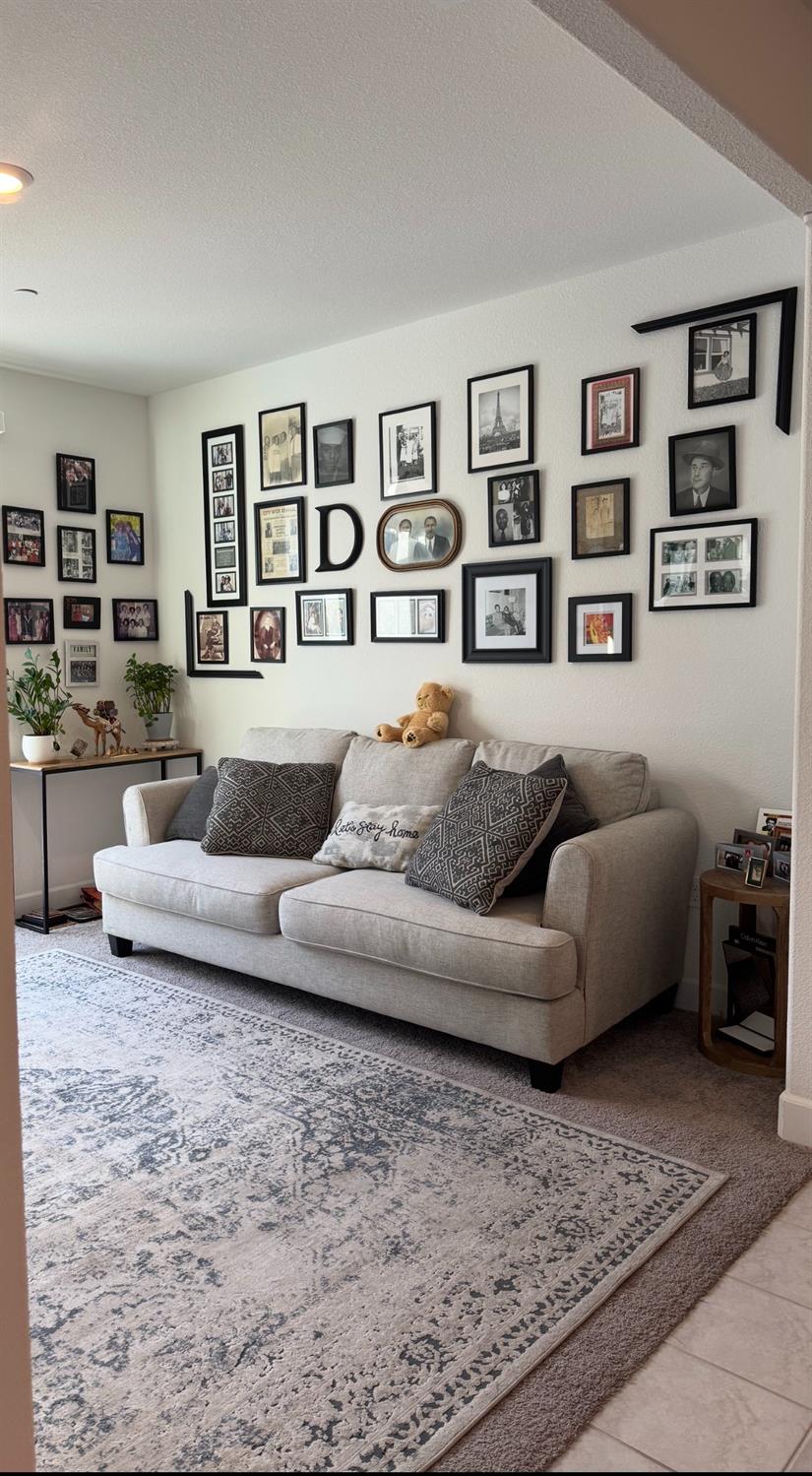 461 Walcott Street Manteca, CA 95336 - Photo 7 of 18 a living room with furniture and painting on the wall