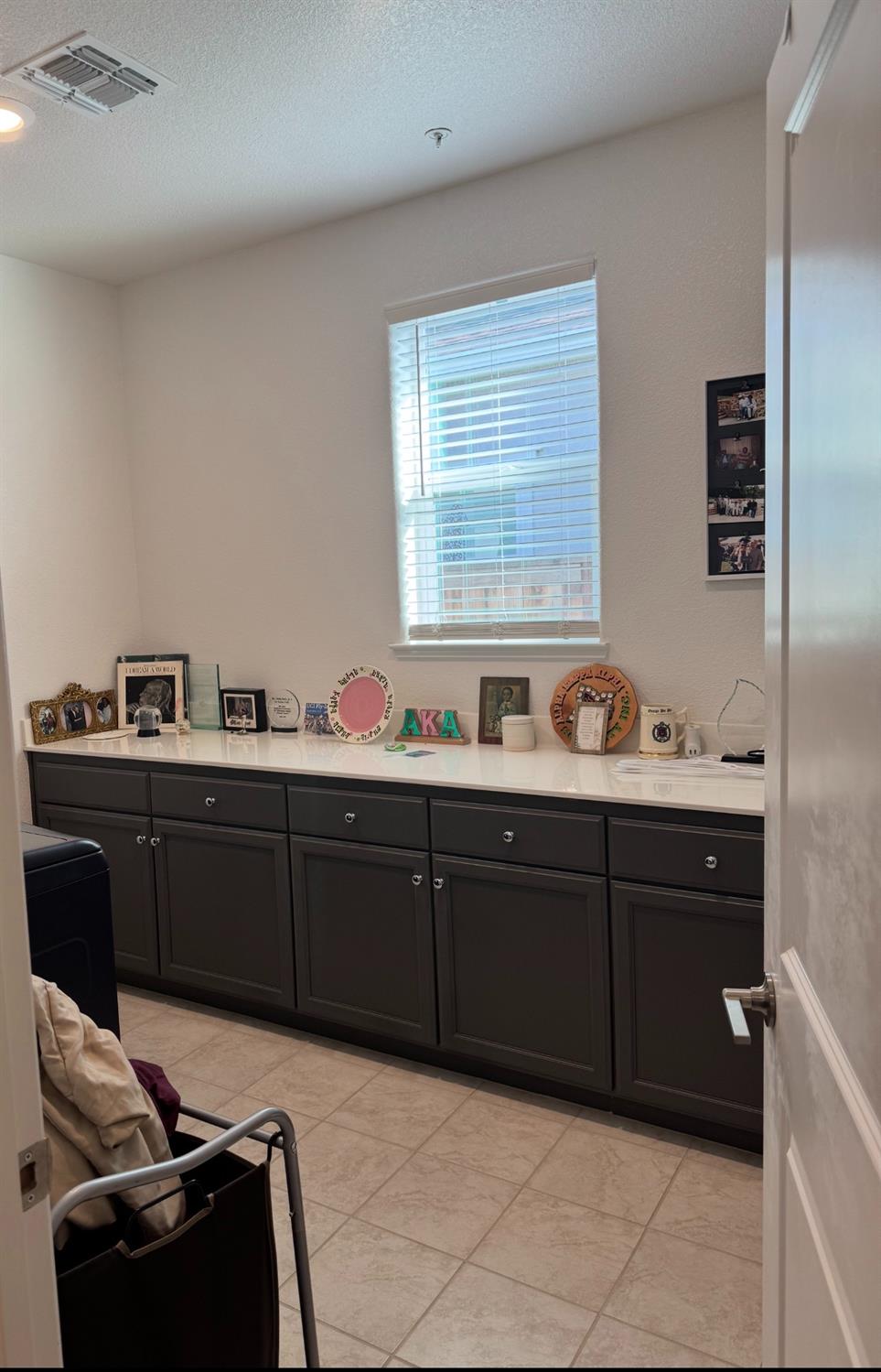 461 Walcott Street Manteca, CA 95336 - Photo 10 of 18 a room with a dresser and a window